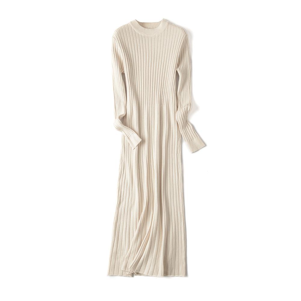 Robe pull élégante automne-hiver basique unie, moulante et épaisse, à col rond et manches longues.
