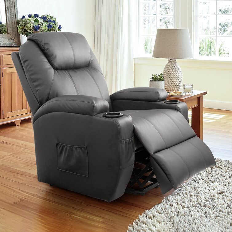Elektrische relaxfauteuil van kunstleer met massage- en verwarmingsfunctie.