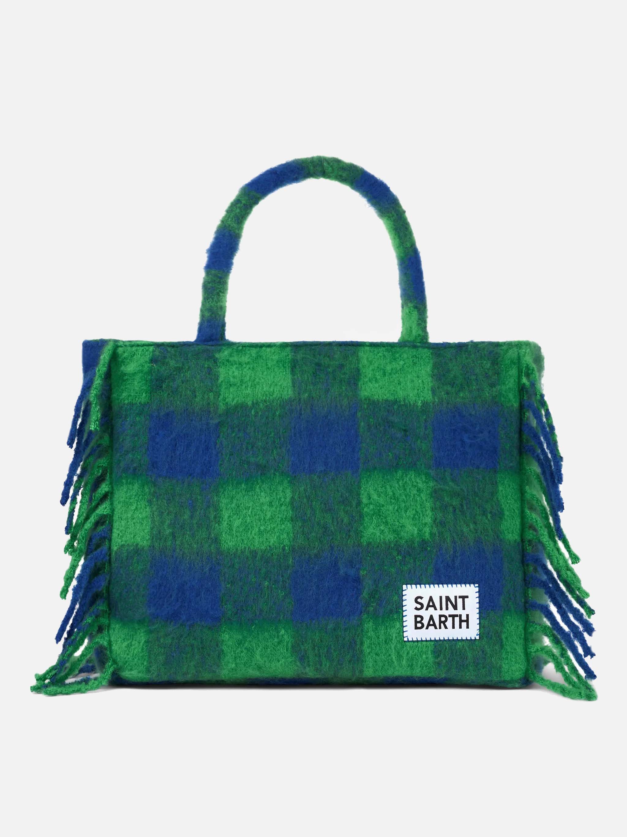 Schoudertas in de stijl van een dekentje met groen en blauw ruitpatroon.