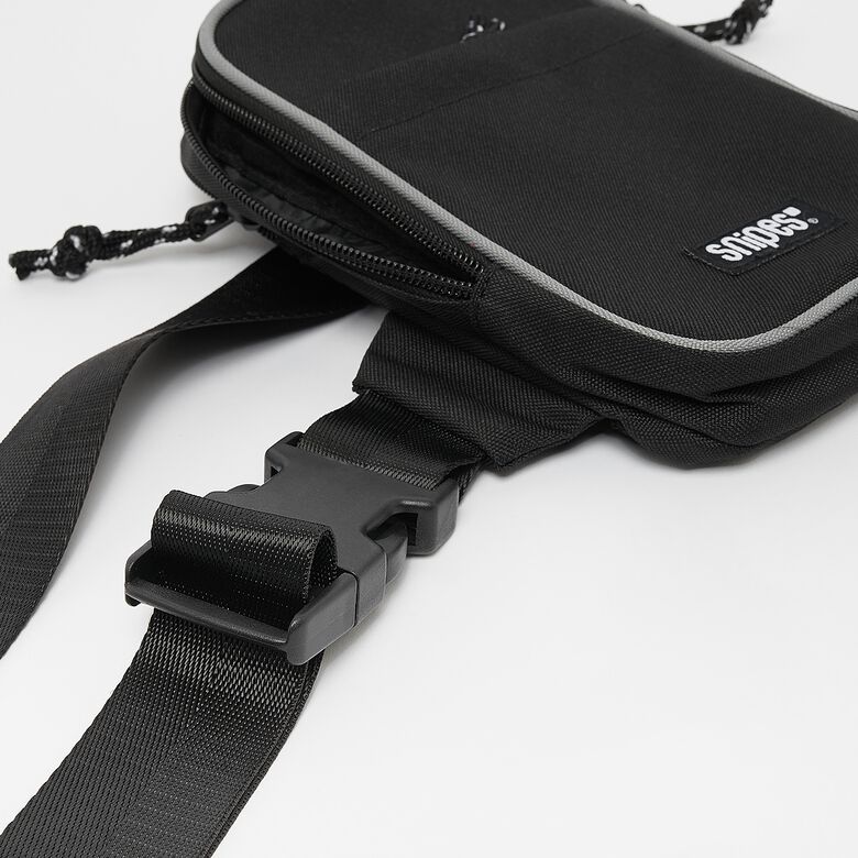 Bolso bandolera pequeño con etiqueta tejida y logo básico