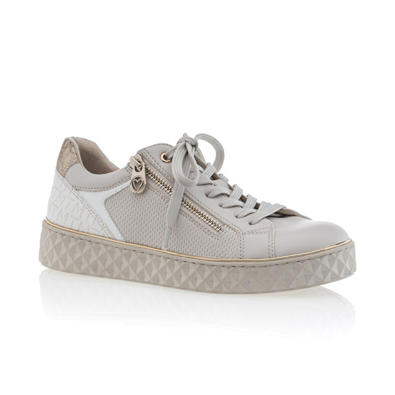 Zapatillas deportivas para mujer color beige.