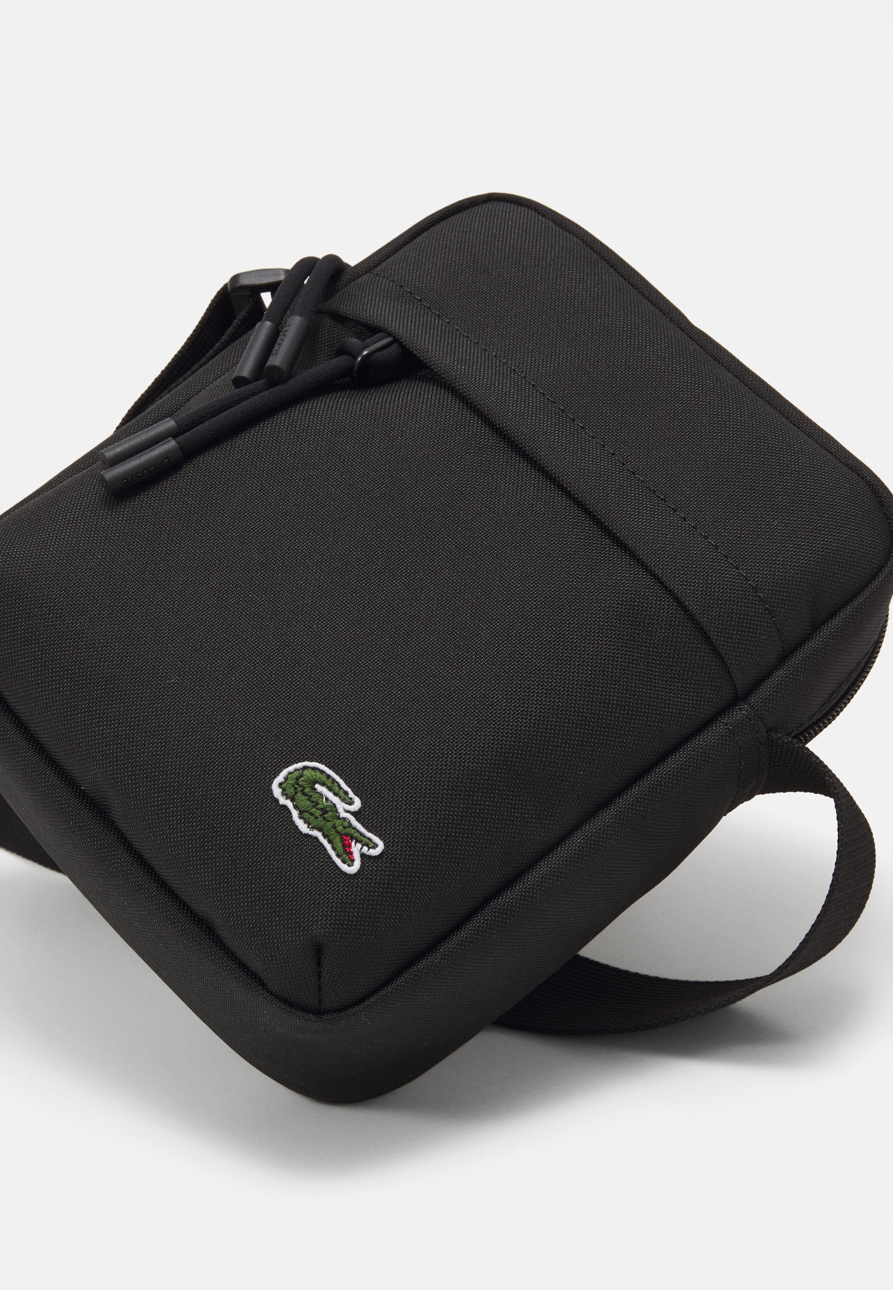 Lacoste VERTICAL CAMERA TAS UNISEX - Crossbodytas - zwart