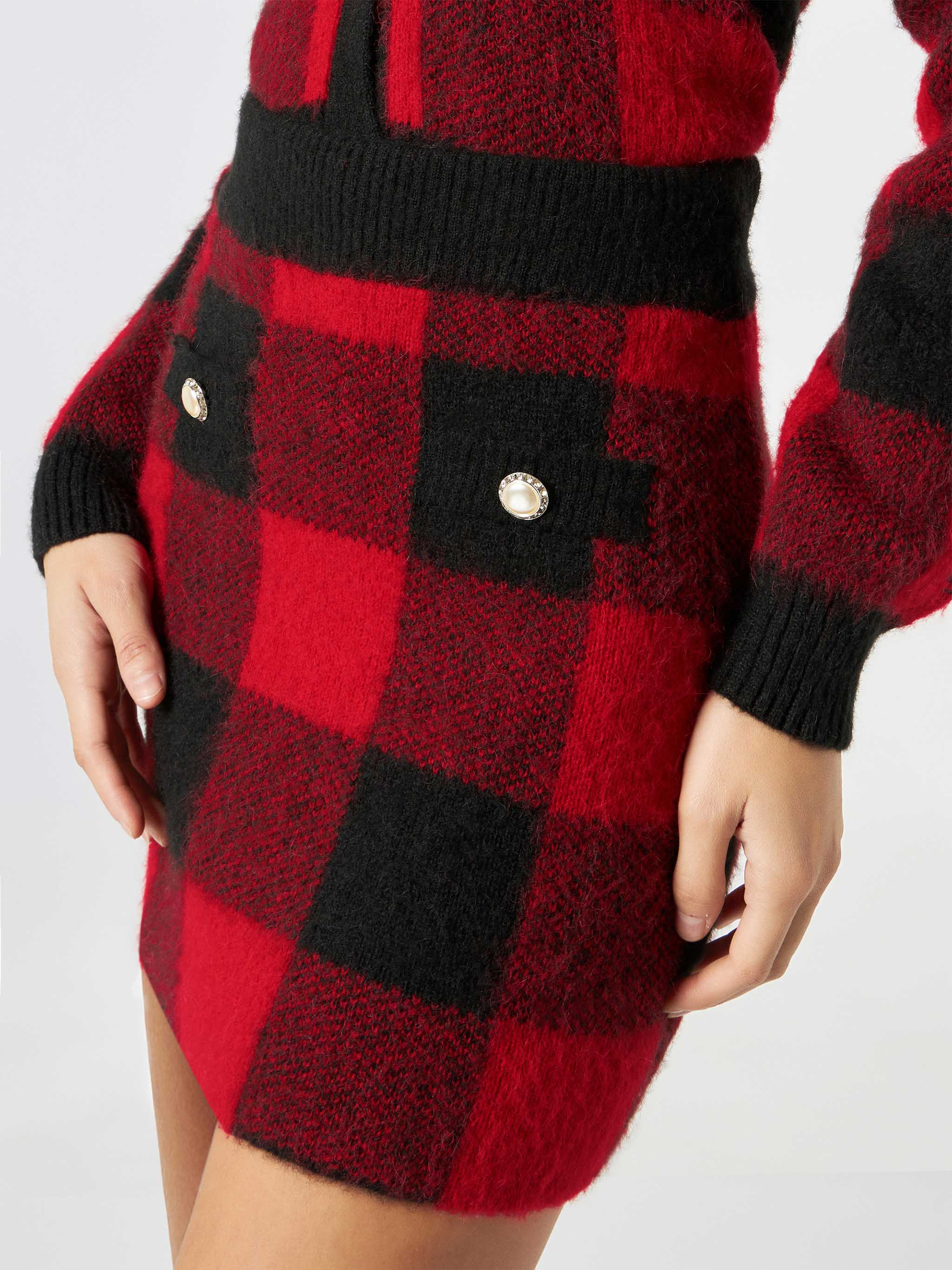 Falda de mujer con botones de joyería