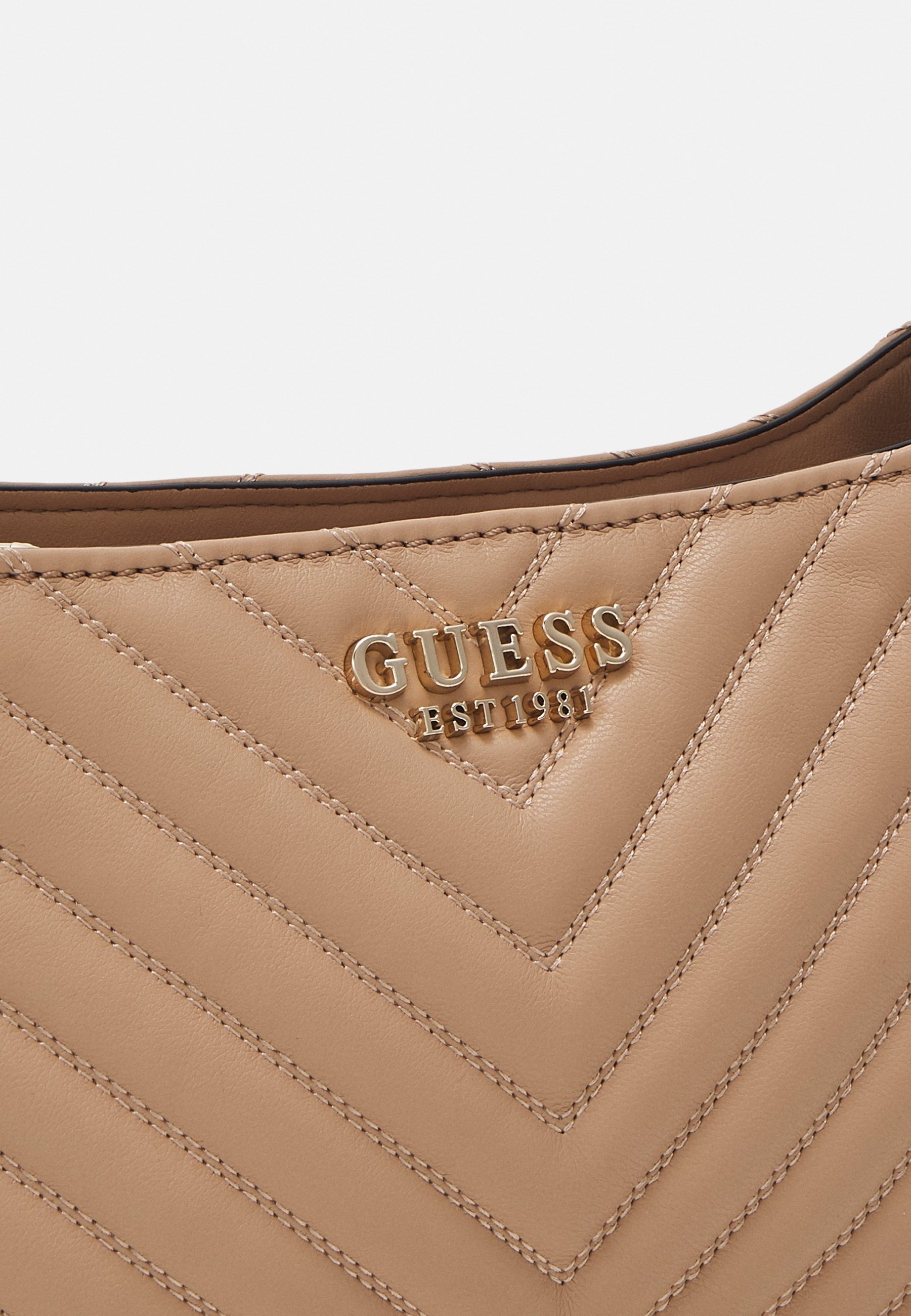 Guess handtas - beige