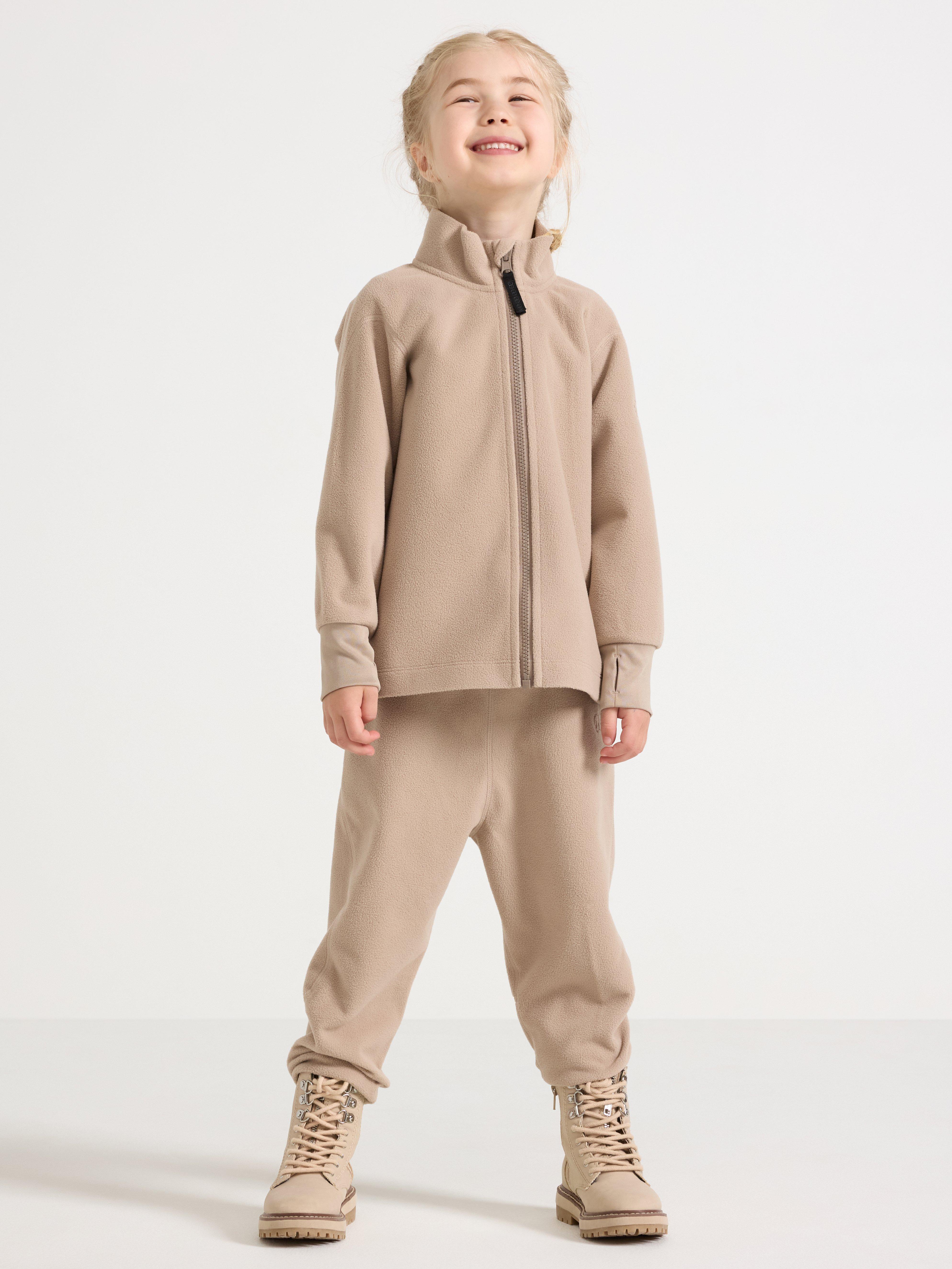 Vattentäta vindfleecebyxor – Kids Performance Wear Dusty Beige