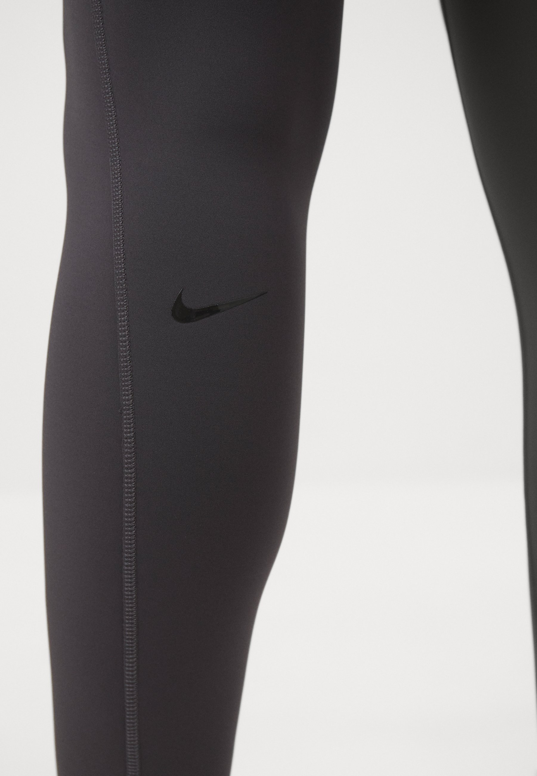 Legging Nike Performance UNIVERSA SEAMLESS FRONT - Gris orage Gris orage Ombre foncée