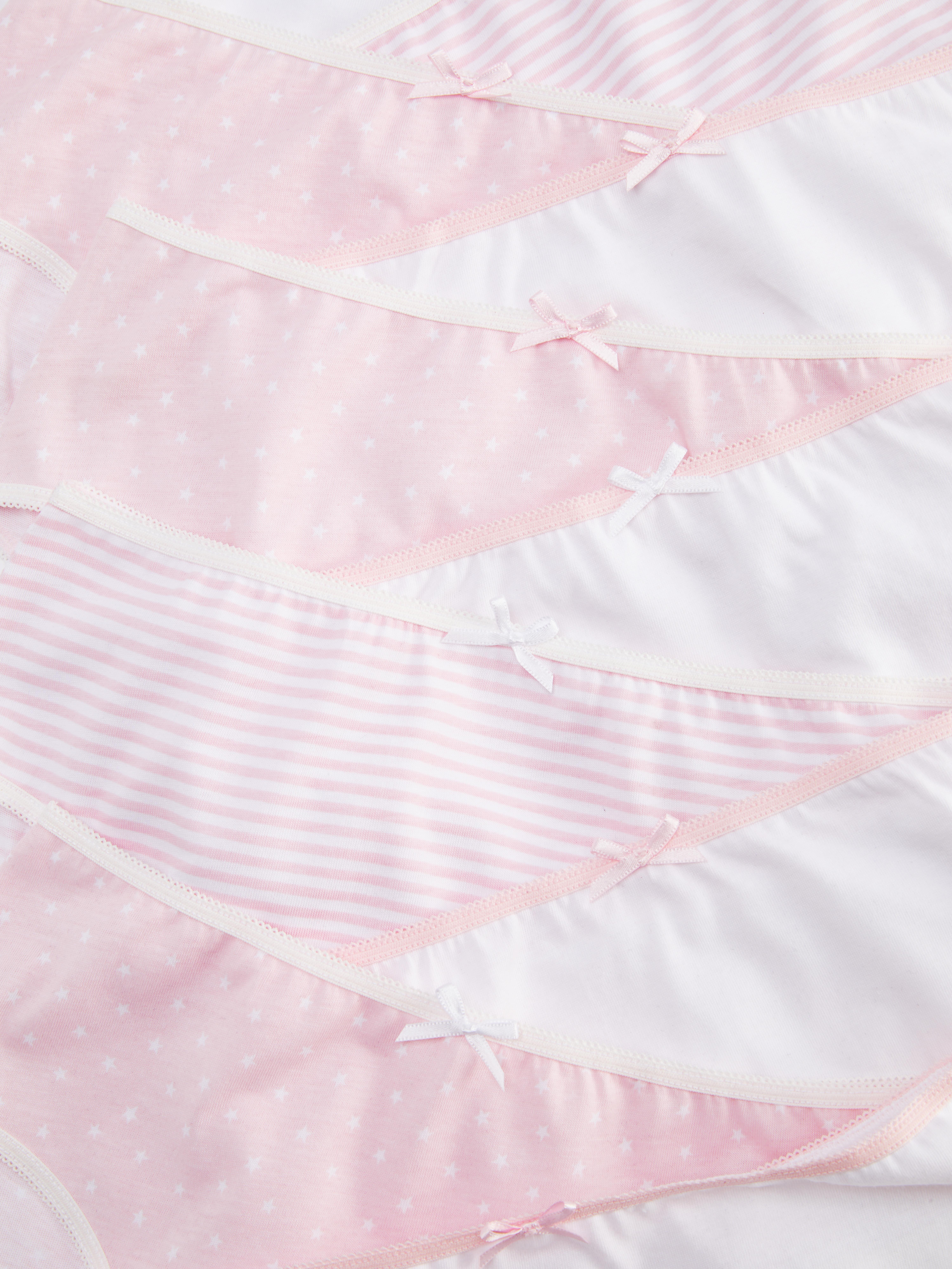 Slips met verschillende patronen, set van 10 Een multipack gemengde slips met elastische randen en een strikje
