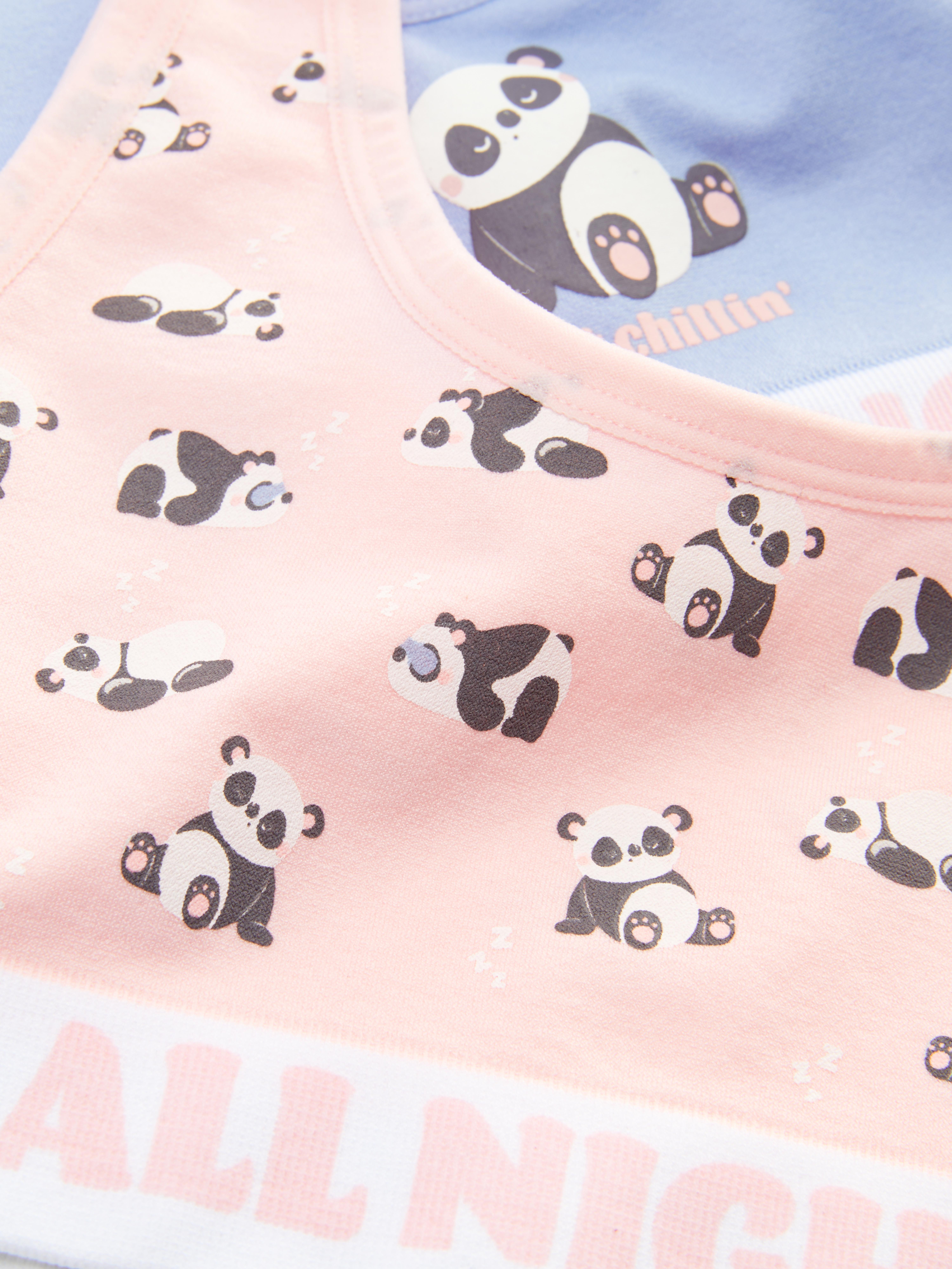 Korte vesten met pandaprint en tekst, set van 2 Een set van twee korte vesten met panda-afbeeldingen
