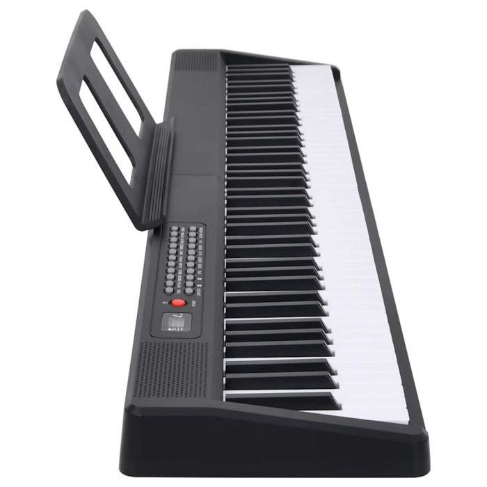 Teclado de piano eléctrico de 88 teclas con atril plegable.