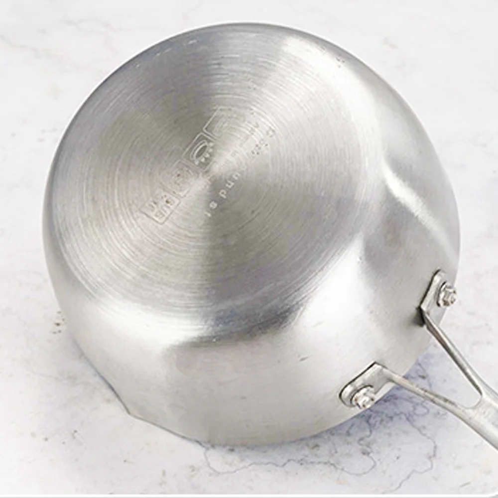Poêle à frire en acier inoxydable 316, idéale pour la cuisson des steaks, avec revêtement antiadhésif alvéolé et fond plat. Compatible avec les plaques à induction et autres ustensiles de cuisine.
