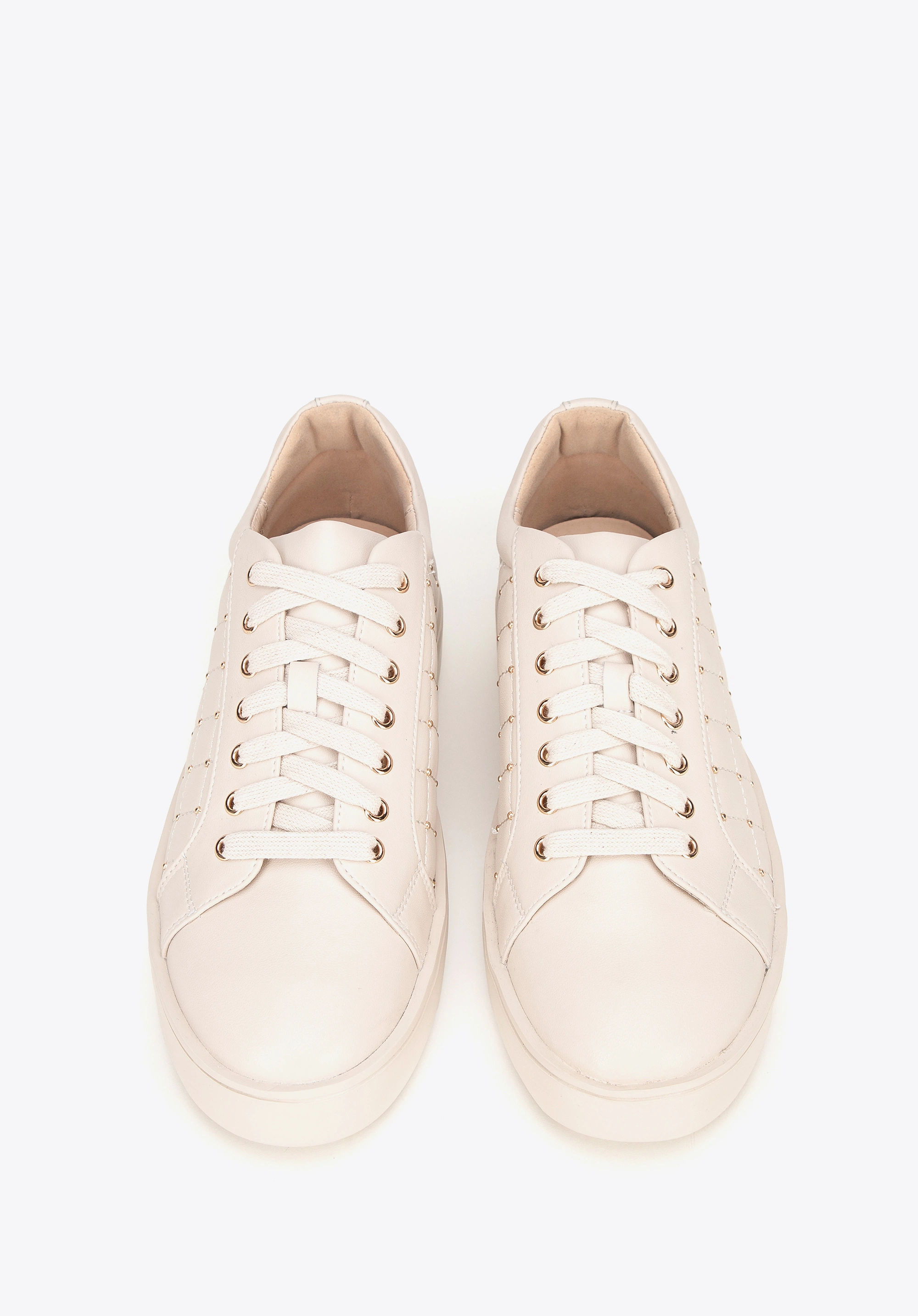 Damskie sneakersy skórzane z pikowaną cholewką kremowe