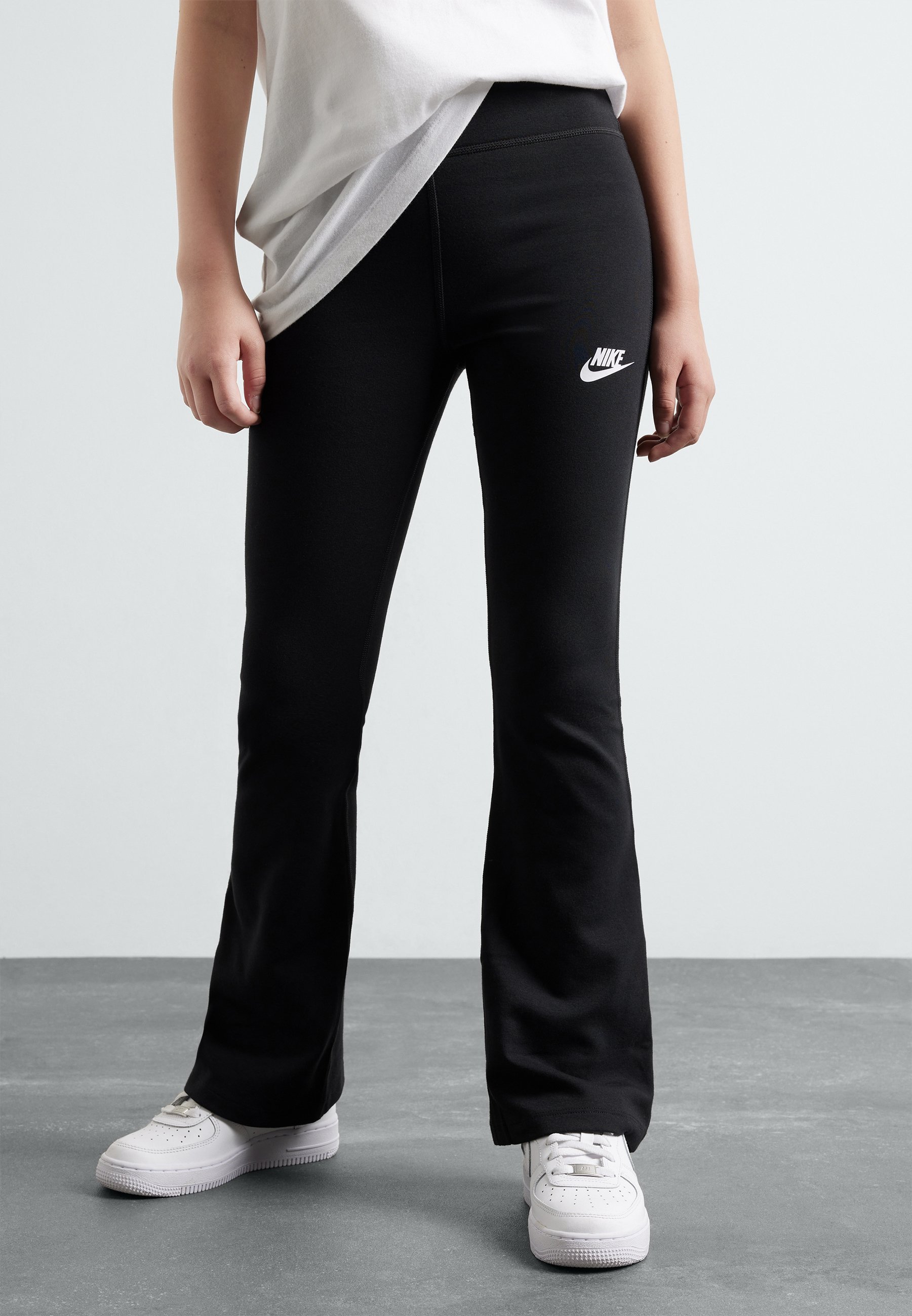 Nike Sportswear FLARE - Spodnie dresowe - czarno-białe