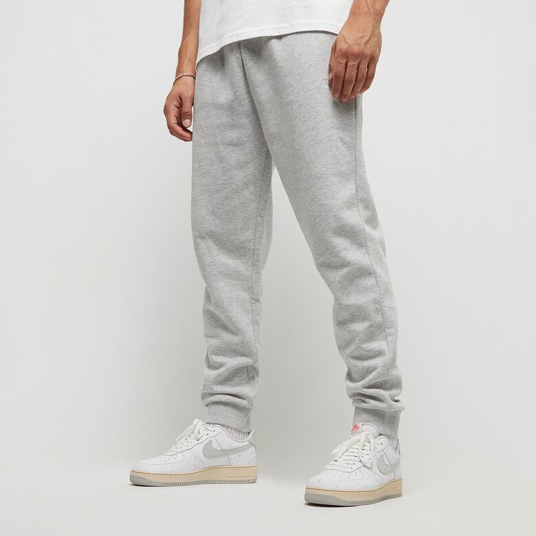 Pantalones deportivos ajustados con logo pequeño
