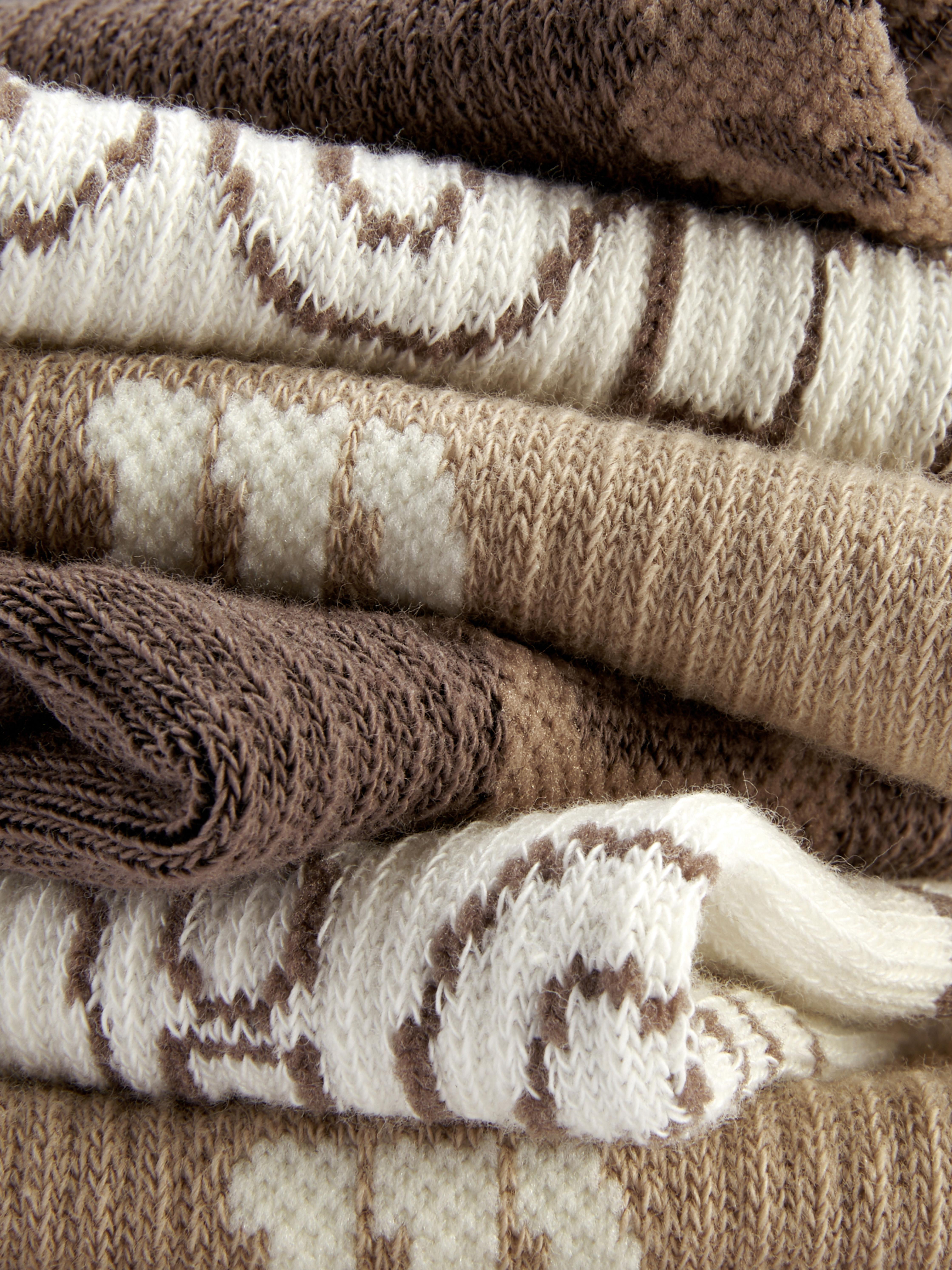 Wilson gepolsterte, mittelhohe Sportsocken, 3 Paar. Drei Paar gepolsterte Wilson Sportsocken in neutralem Design.