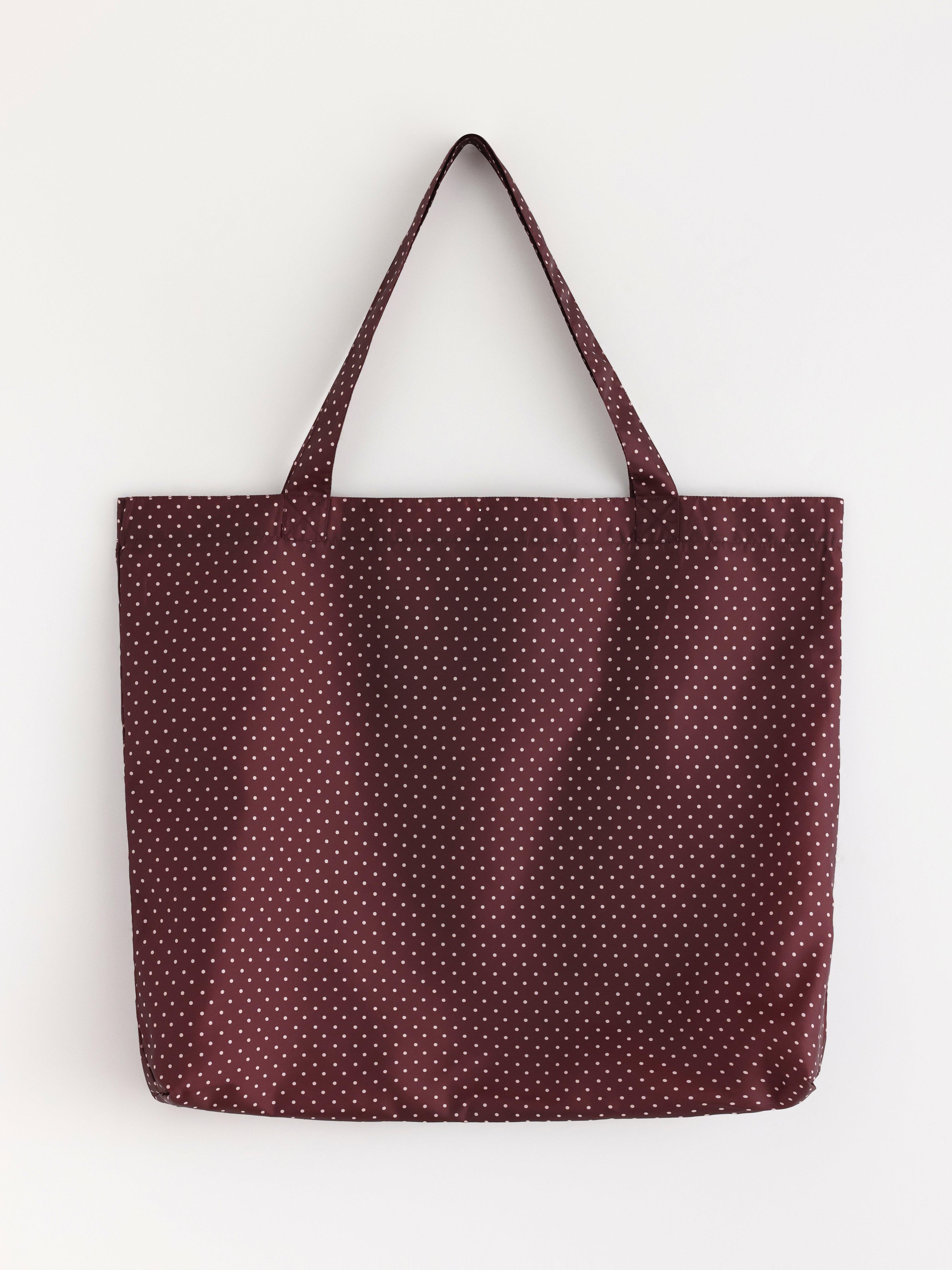 Bolsa de compras plegable, color rojo oscuro empolvado.
