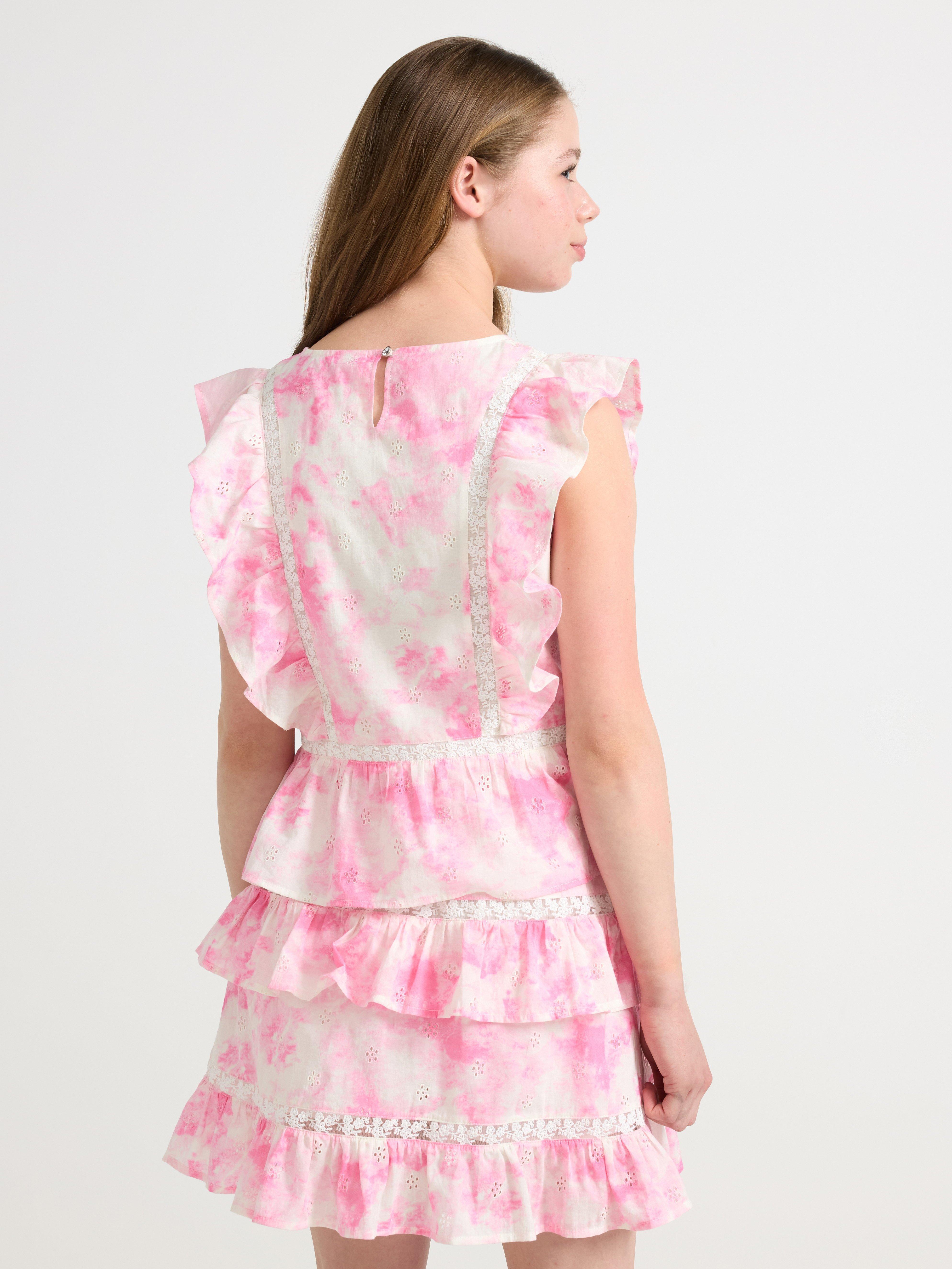 Blusa con volantes rosa claro