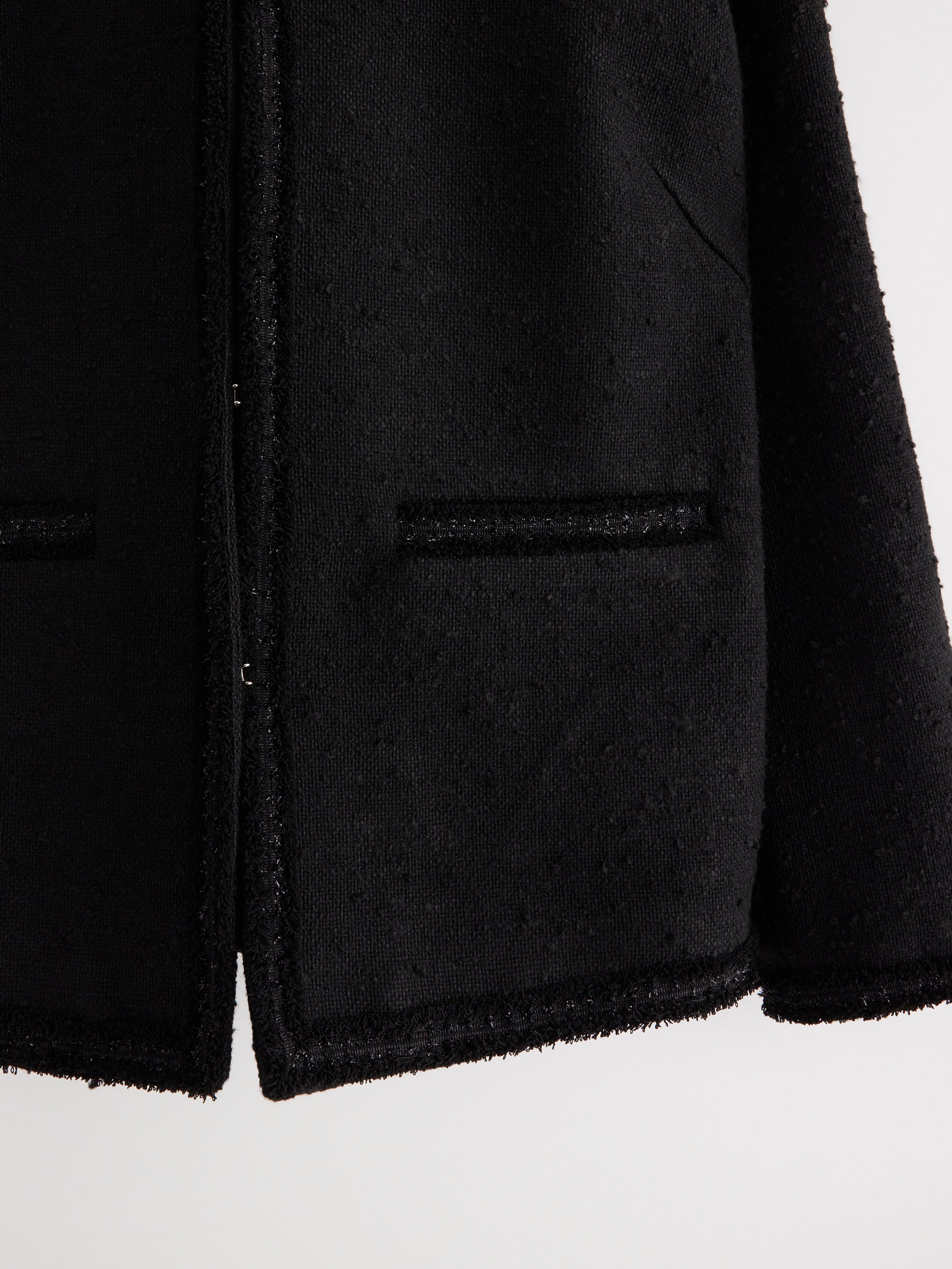 Jaqueta com detalhes em lurex preto