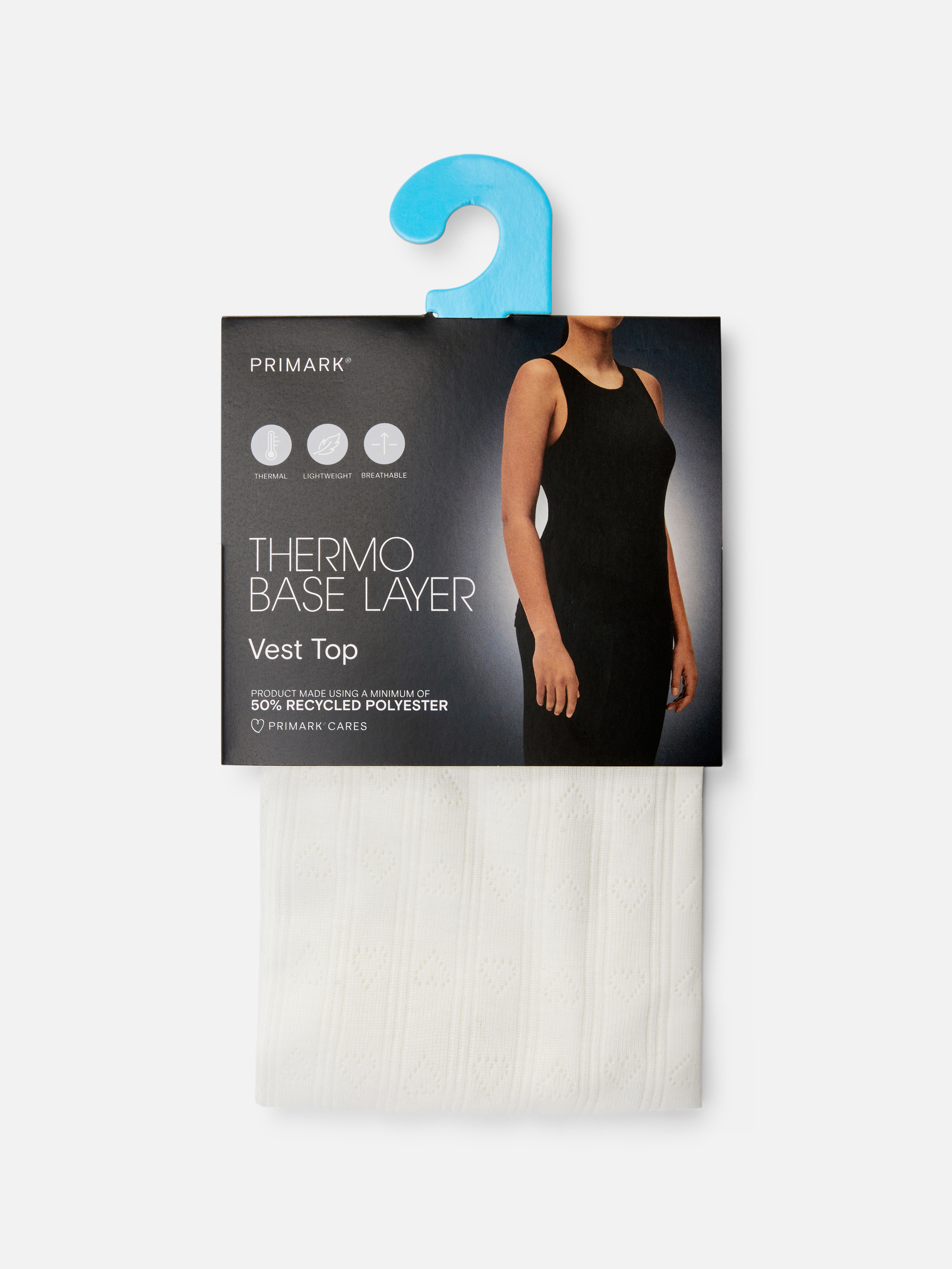 Thermoshirt mit Lochmuster. Halten Sie sich warm in dieser schmal geschnittenen Thermoweste mit gestricktem Lochmuster.