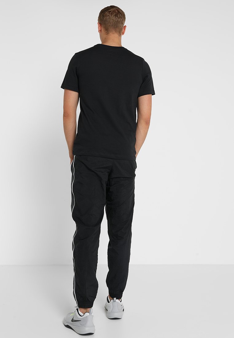 Nike Performance CREW SOLID - Sport T-shirt - zwart/wit
