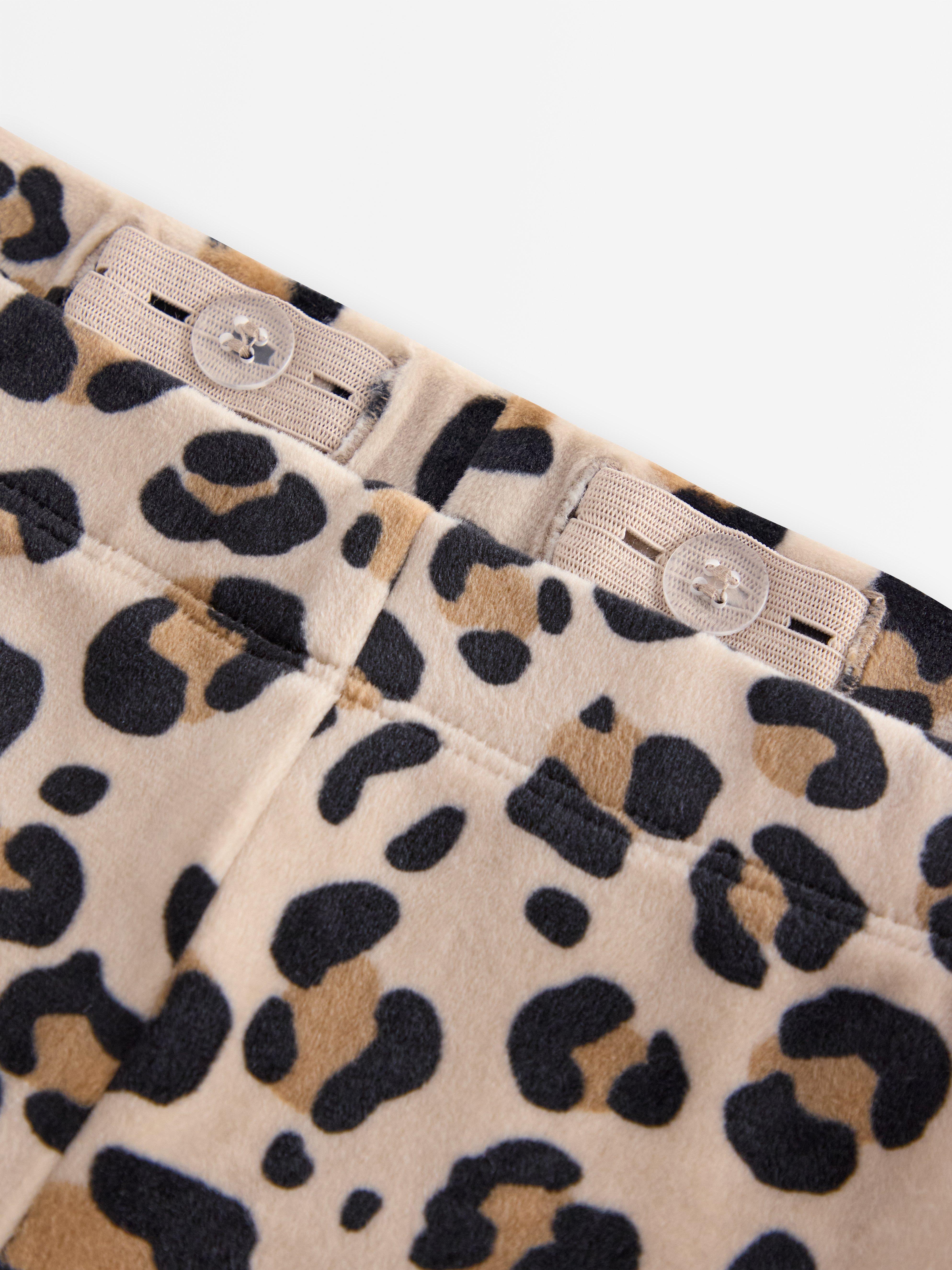 Calças legging flare em veludo bege