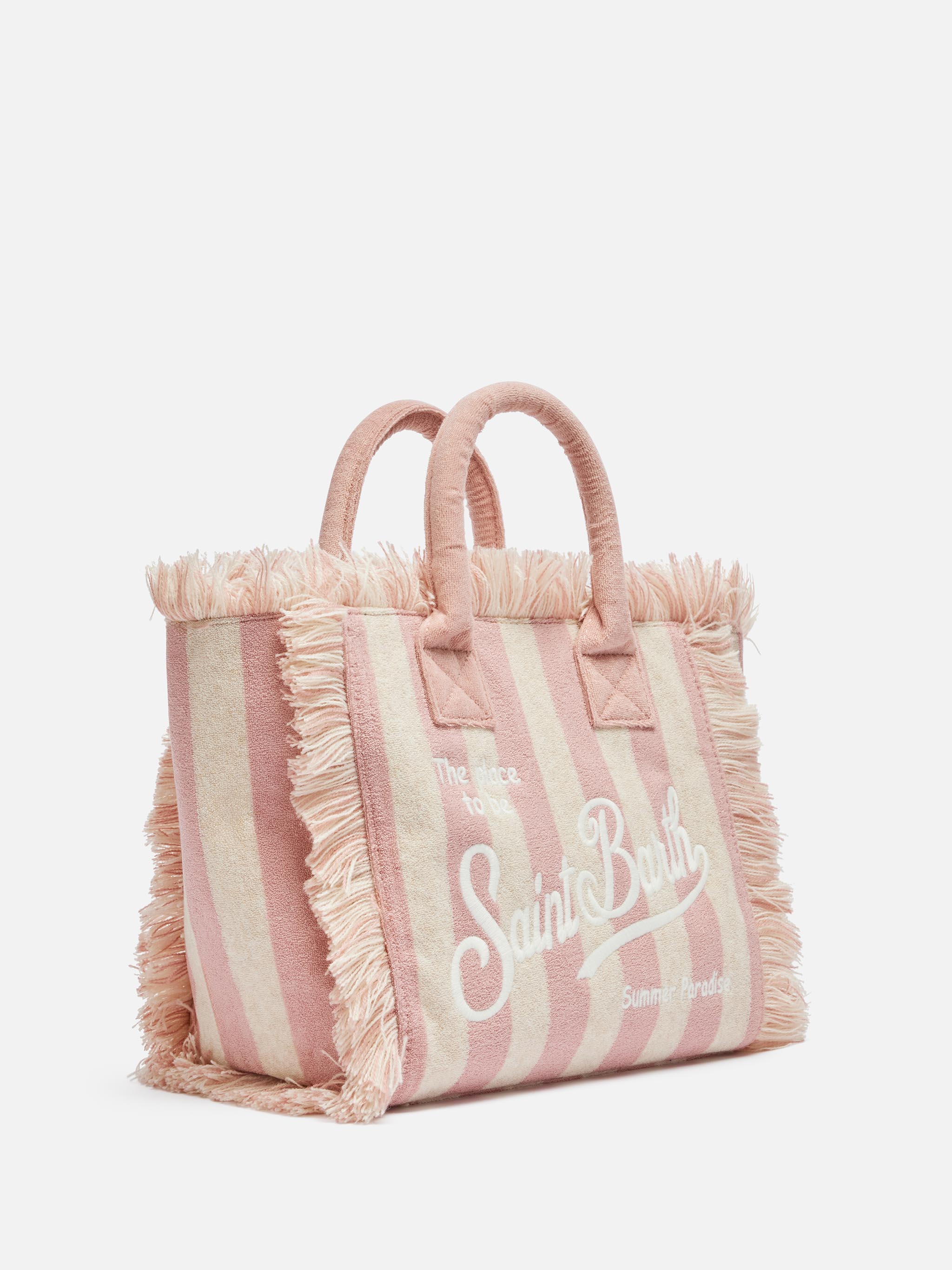 Bolsa Colette em esponja rosa claro com estampa de listras rosa.