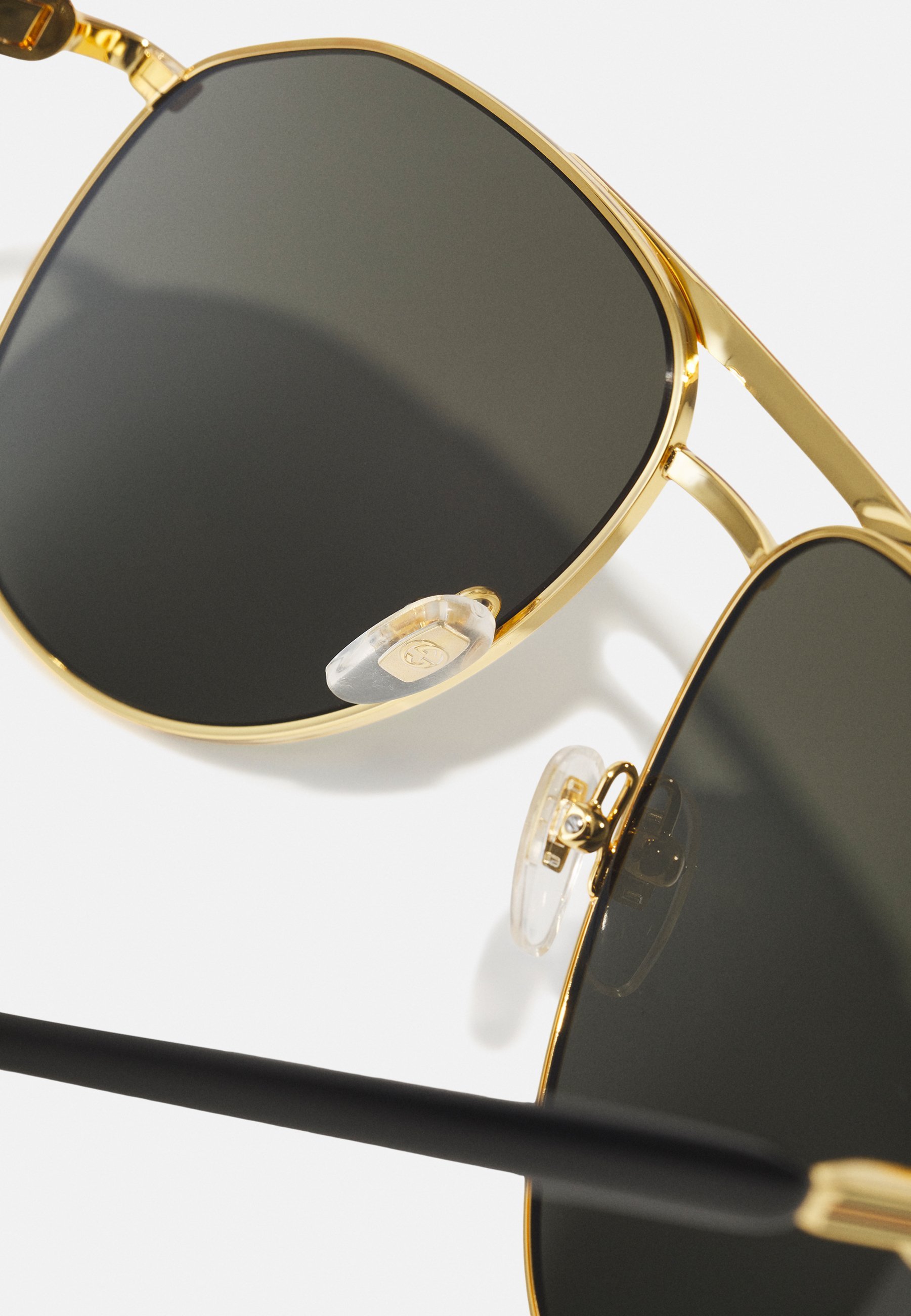Occhiali da sole Gucci - oro/grigio
