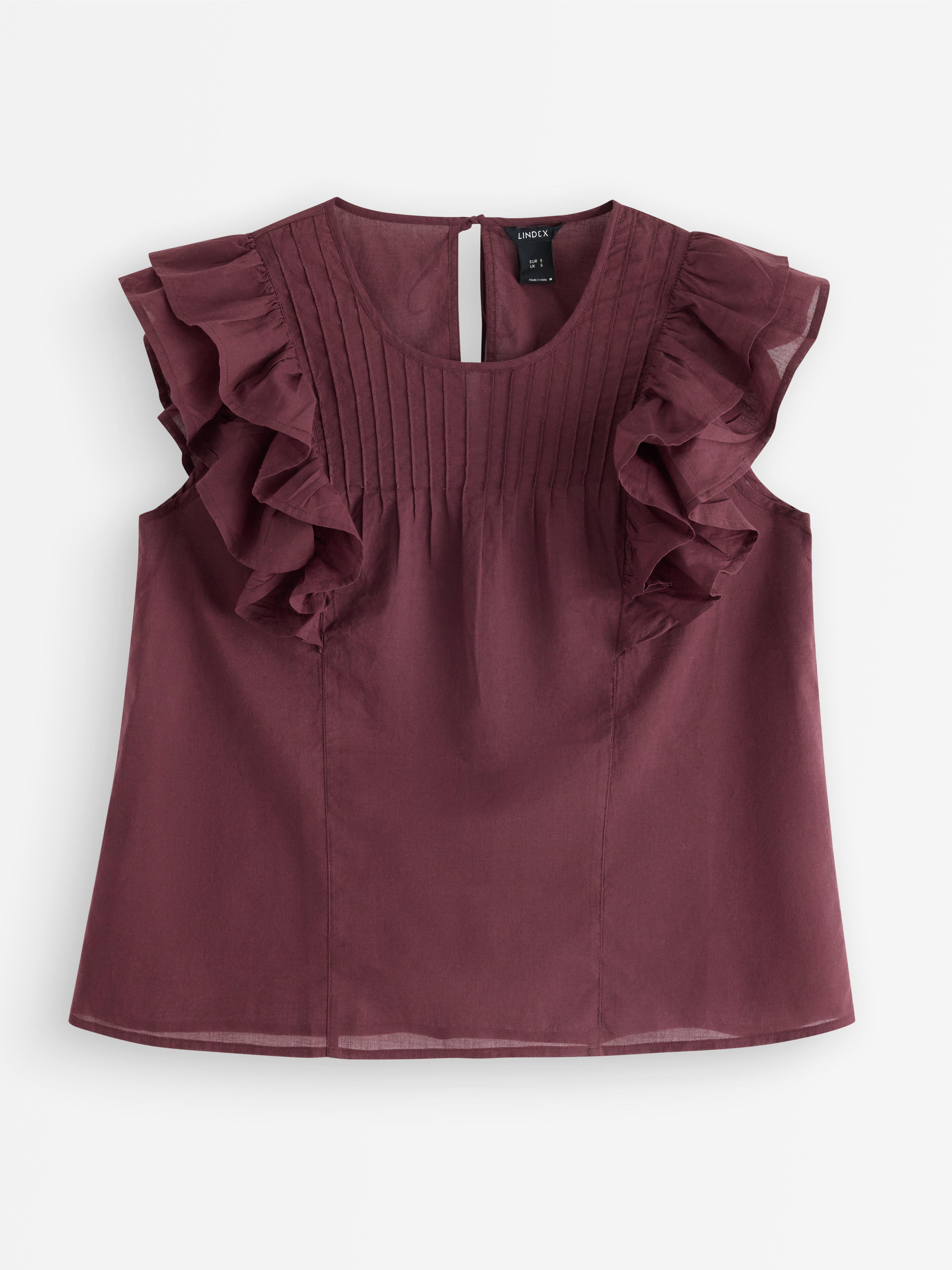 Blusa sin mangas rojo oscuro