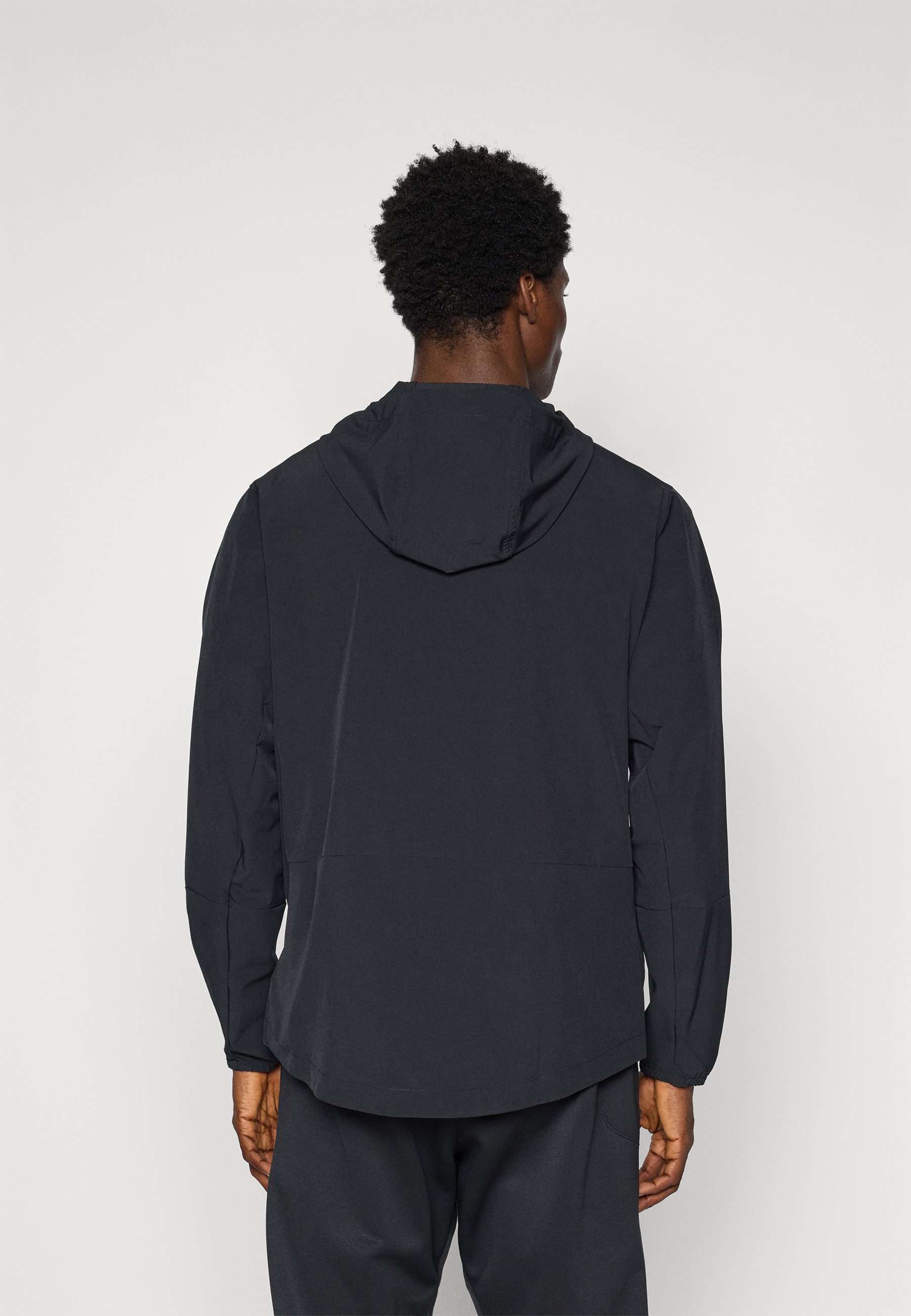 Nike Performance UNLIMITED - Verryttelytakki - black