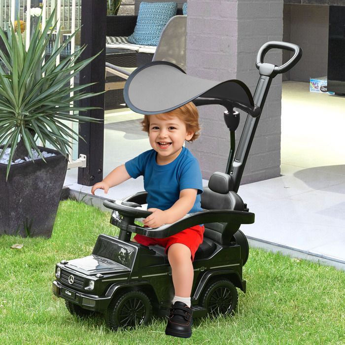Coche de juguete infantil HOMCOM - Totalmente equipado con claxon, reposapiés y barras de seguridad - Plástico - 12-36 meses - Negro