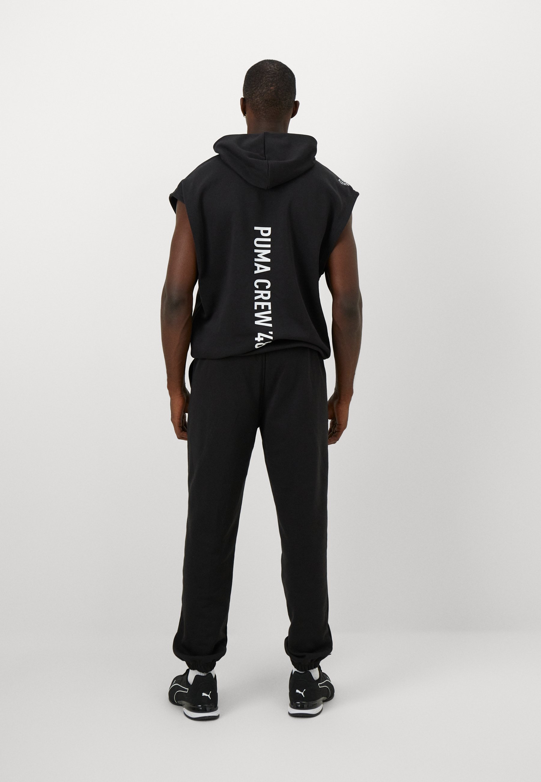 Puma GRAPHIC JOGGER - Trainingshose - schwarz