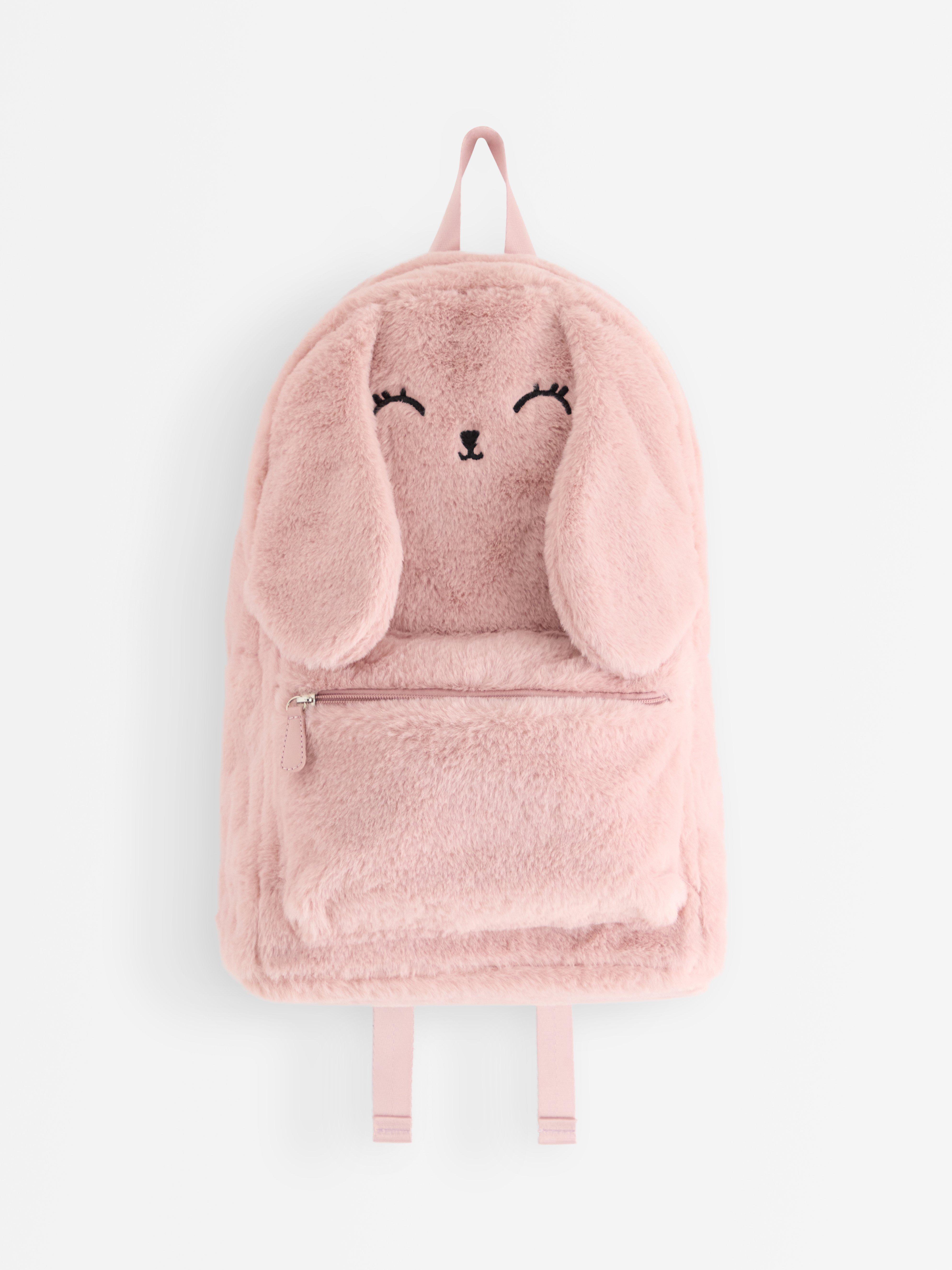 Sac à dos en fausse fourrure rose poudré