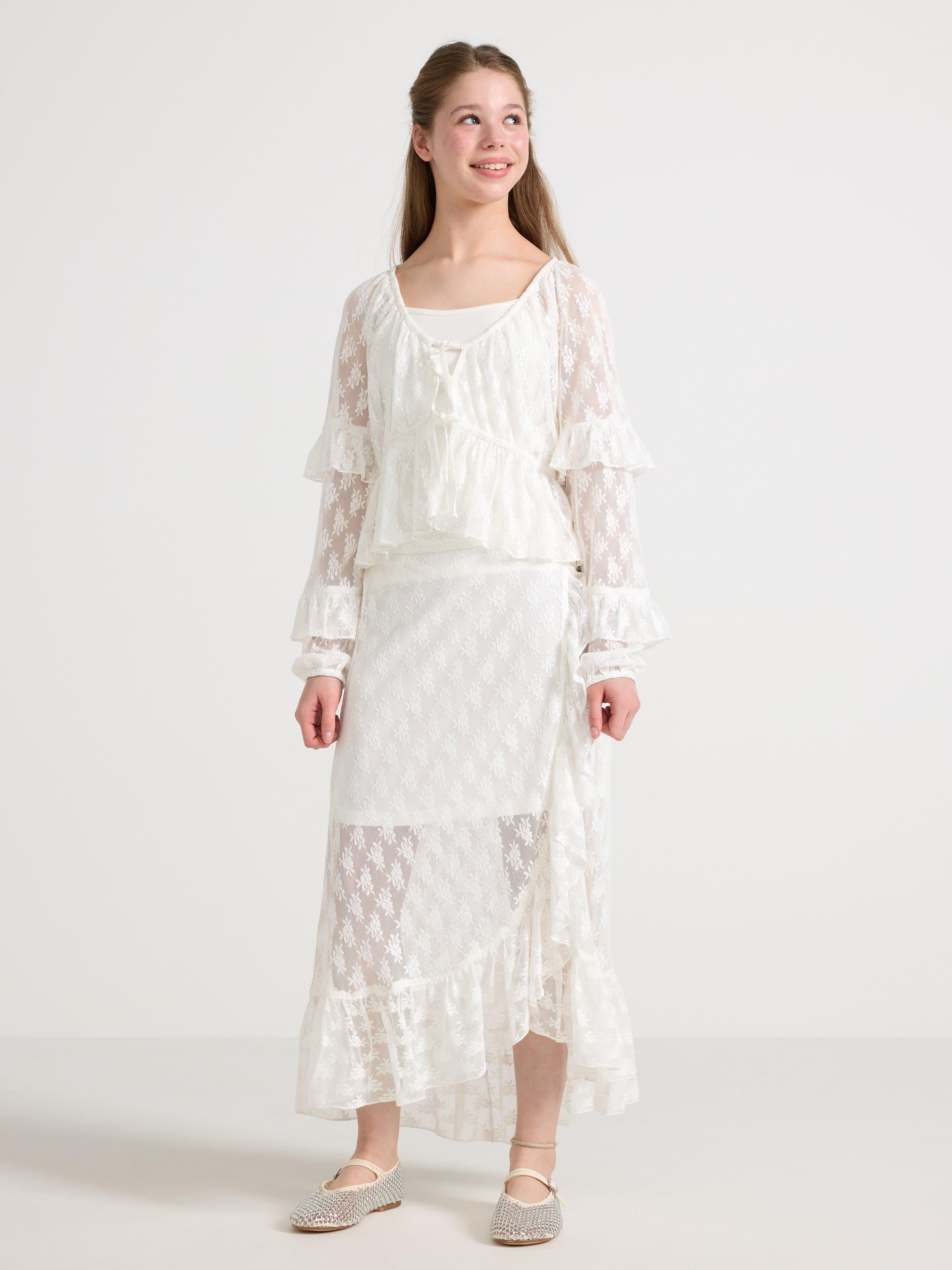 Saia de renda com babados, cor off-white.