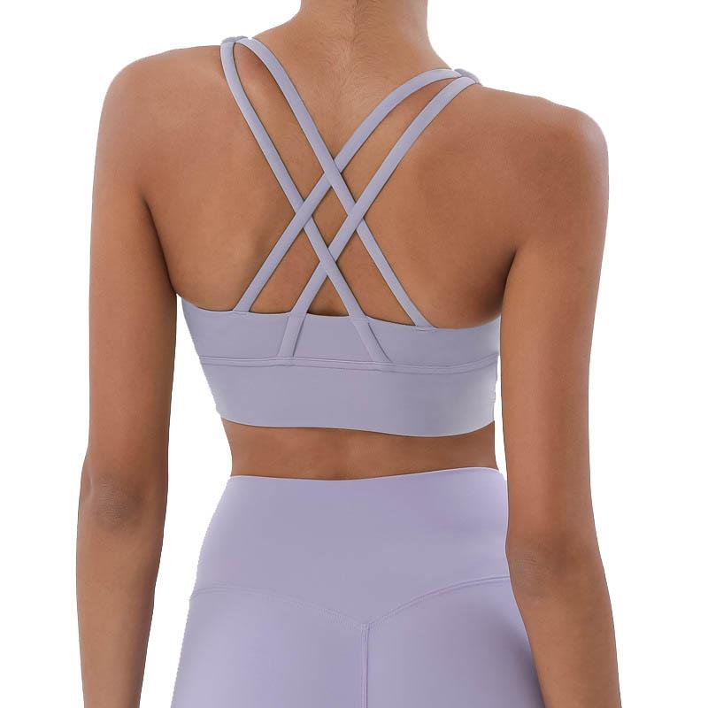Reggiseno sportivo alla moda con spalline incrociate, reversibile, antiurto, arricciato, ideale per yoga, sport e fitness.