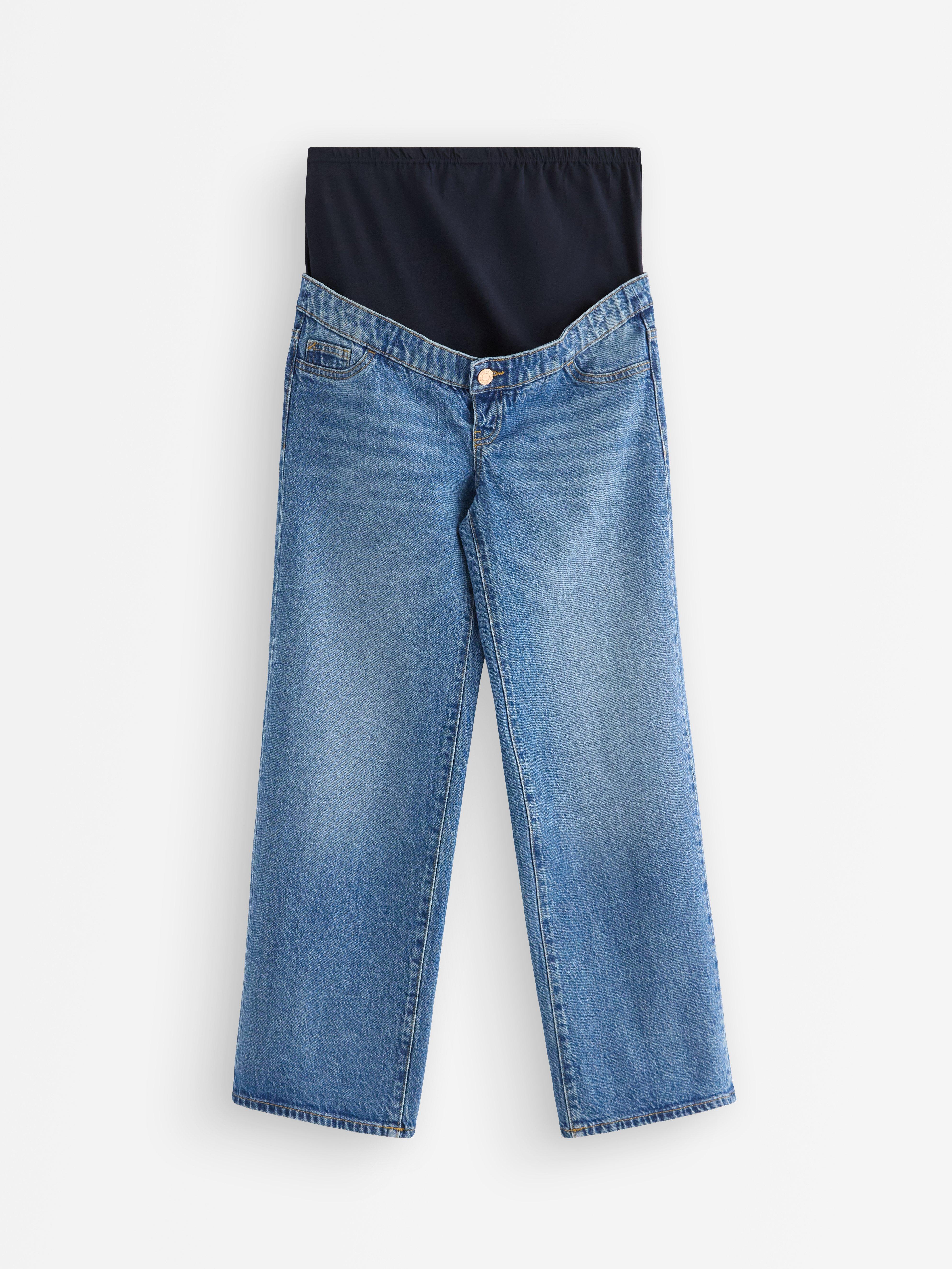 Calça jeans cropped MOM WIDE Hanna para gestantes, em denim claro.