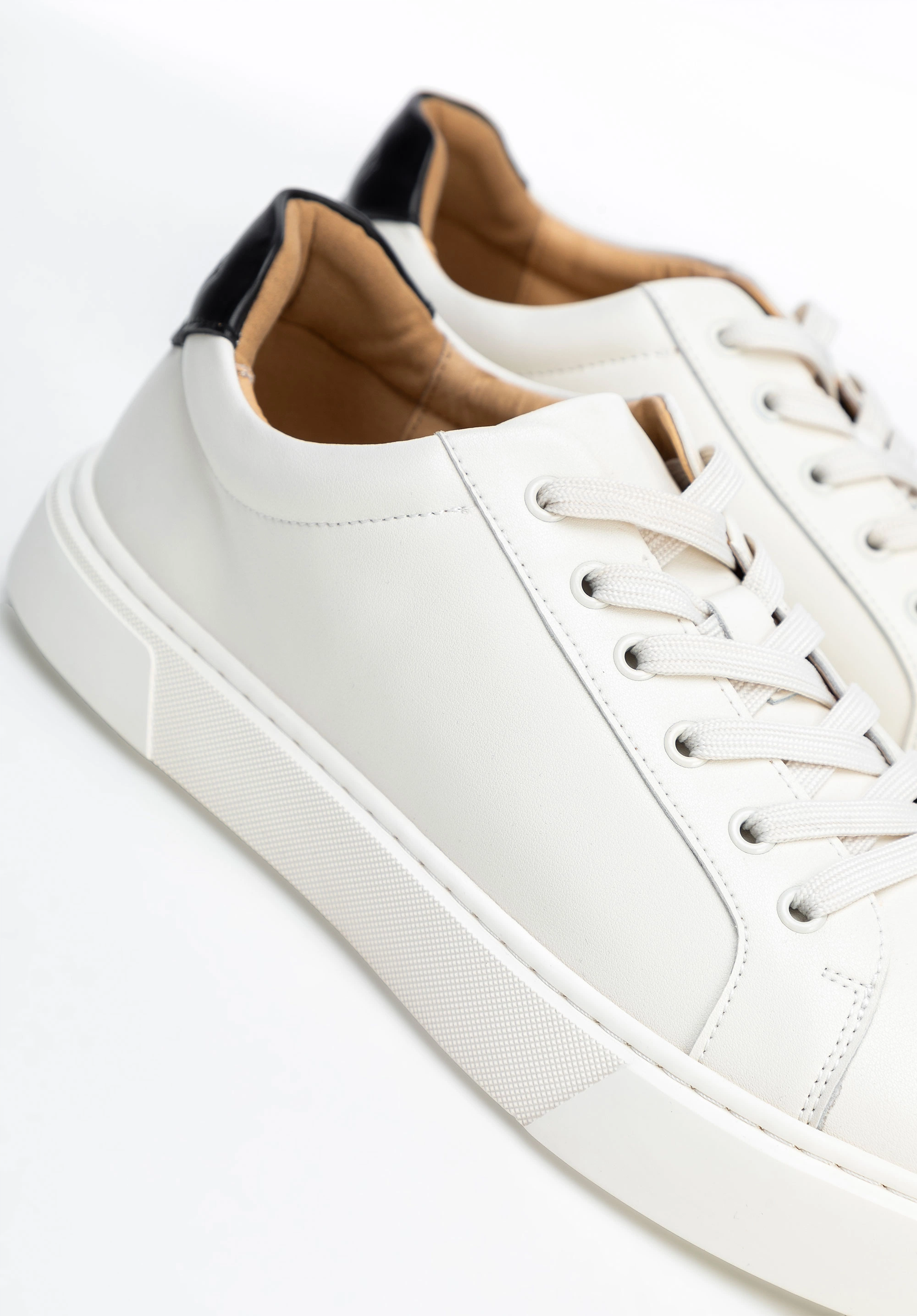 Męskie sneakersy ze skóry dwukolorowe biało - czarne