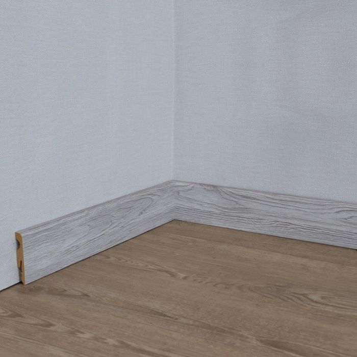 Rodapié PROVISTON de MDF melaminado blanco de 10 x 58 mm con borde redondeado.