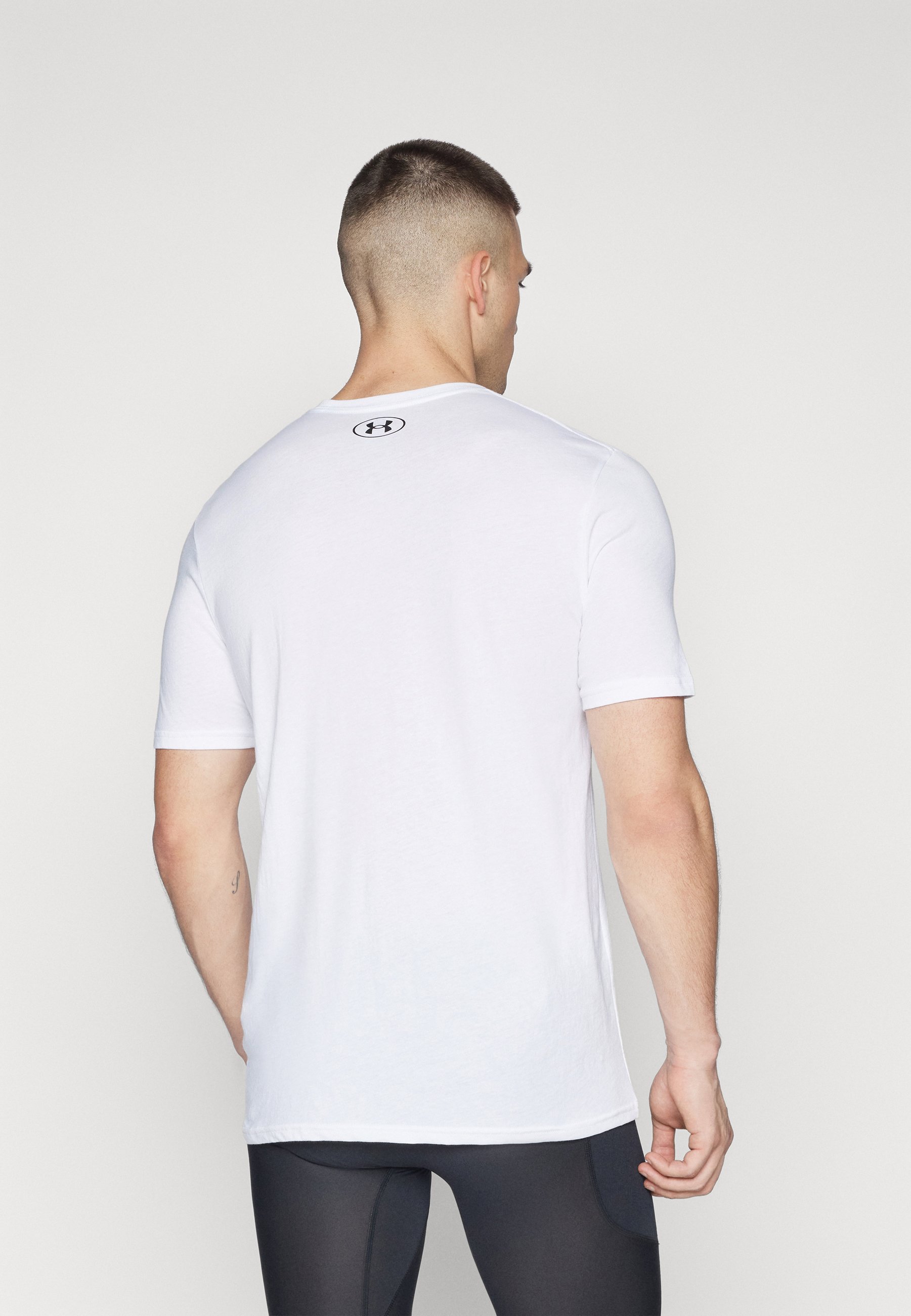 Under Armour logo op de linkerborst - T-shirt met print - wit/zwart