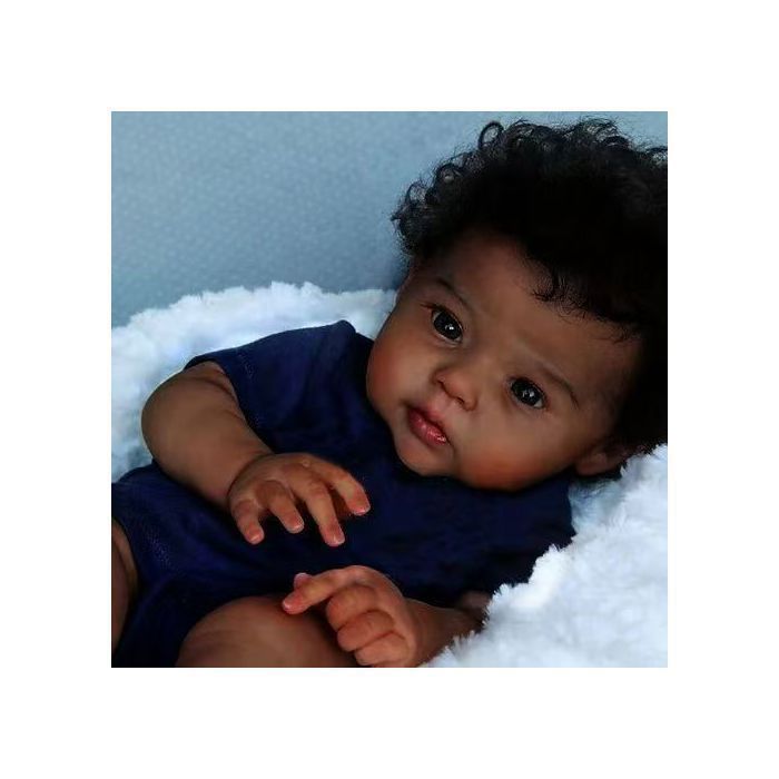 Muñeca Reborn - Cuervo - Piel morena - Cabello rizado - 50 cm - Cuerpo suave - Regalo ideal para Navidad y cumpleaños