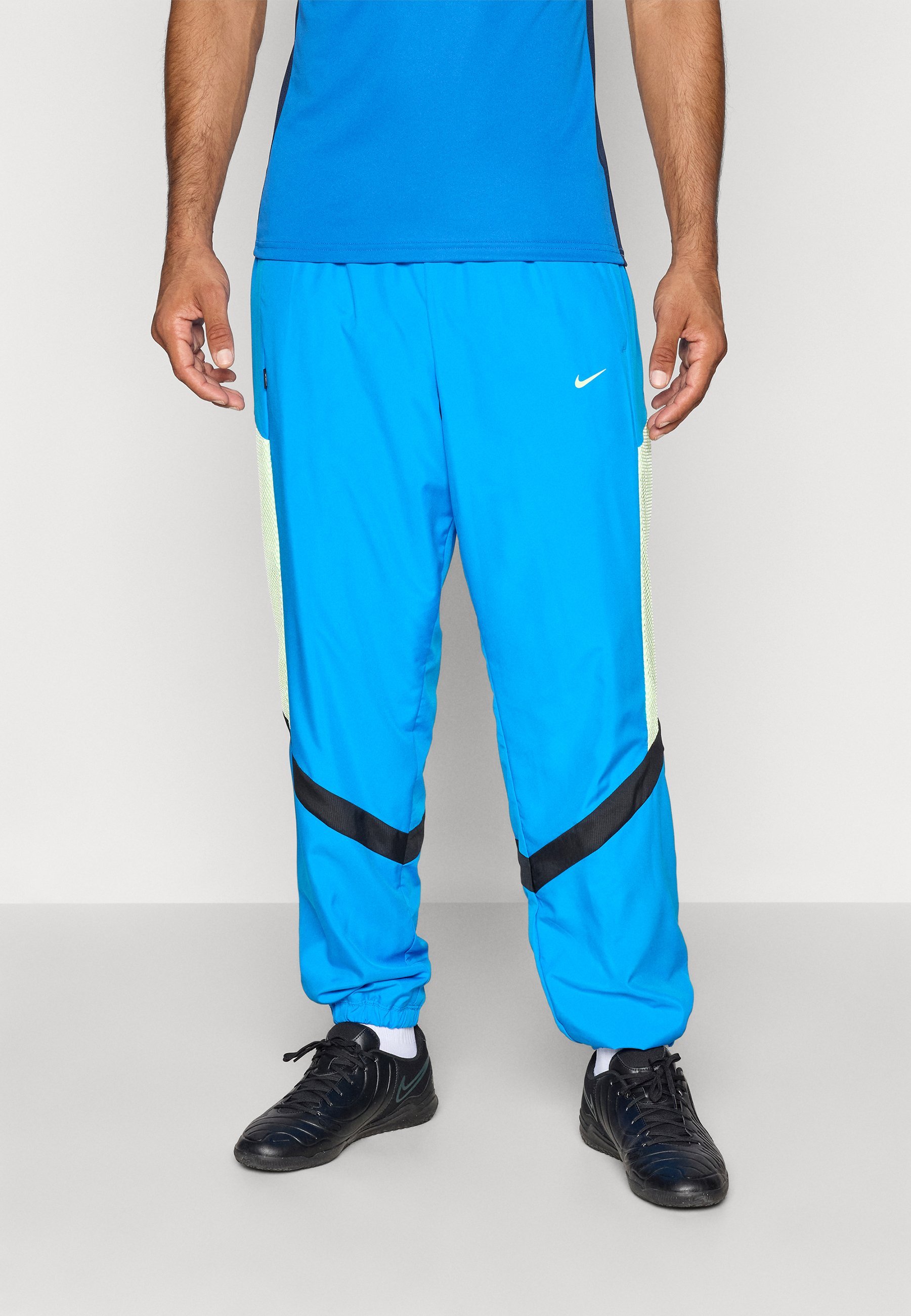 Pantaloni da tuta Nike Performance ICON - blu foto/giallo fluo/nero