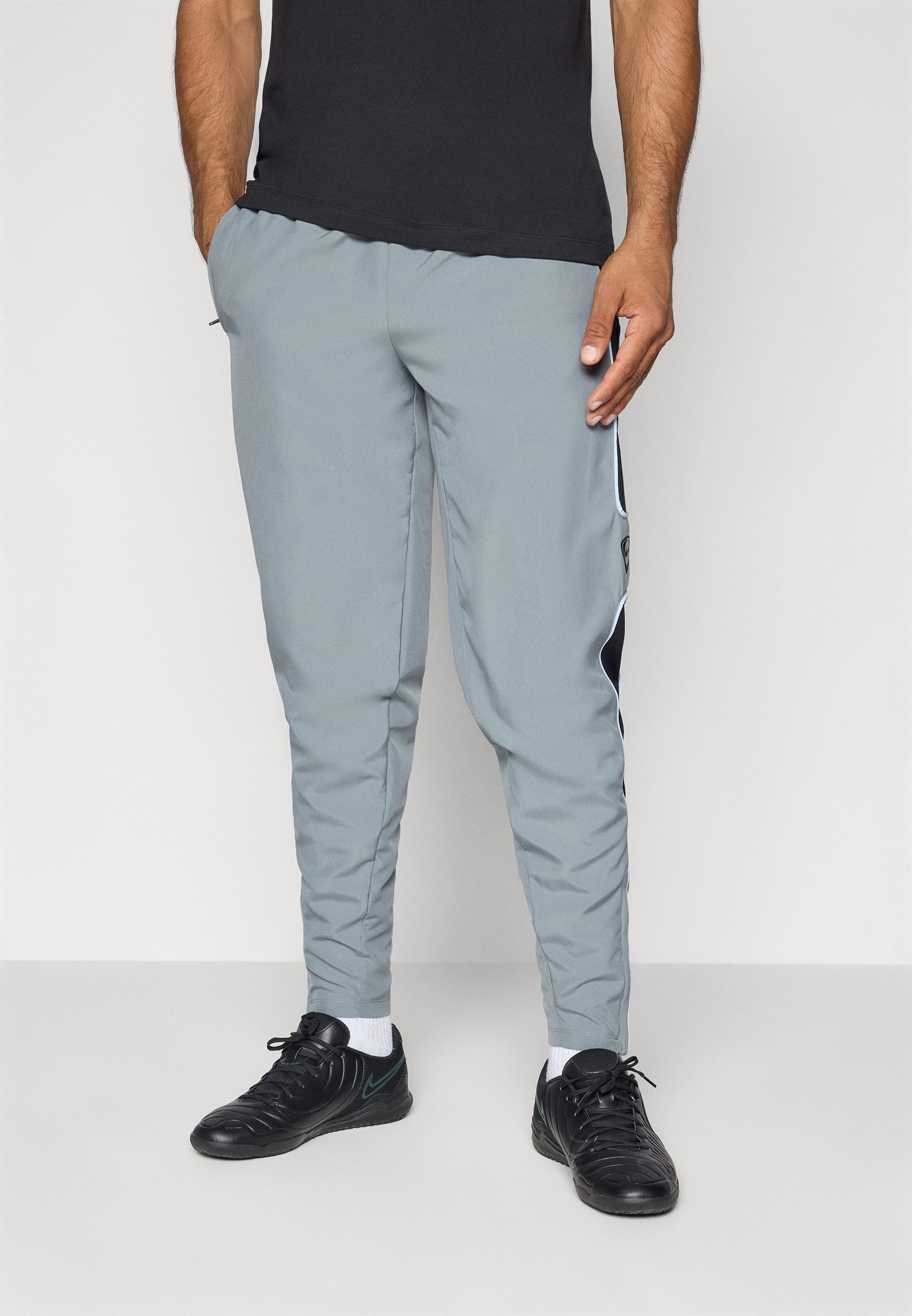 Pantaloni Nike Performance NIKE ACADEMY+ - Pantaloni da tuta - grigio freddo/blu royal/rosso cremisi brillante/nero