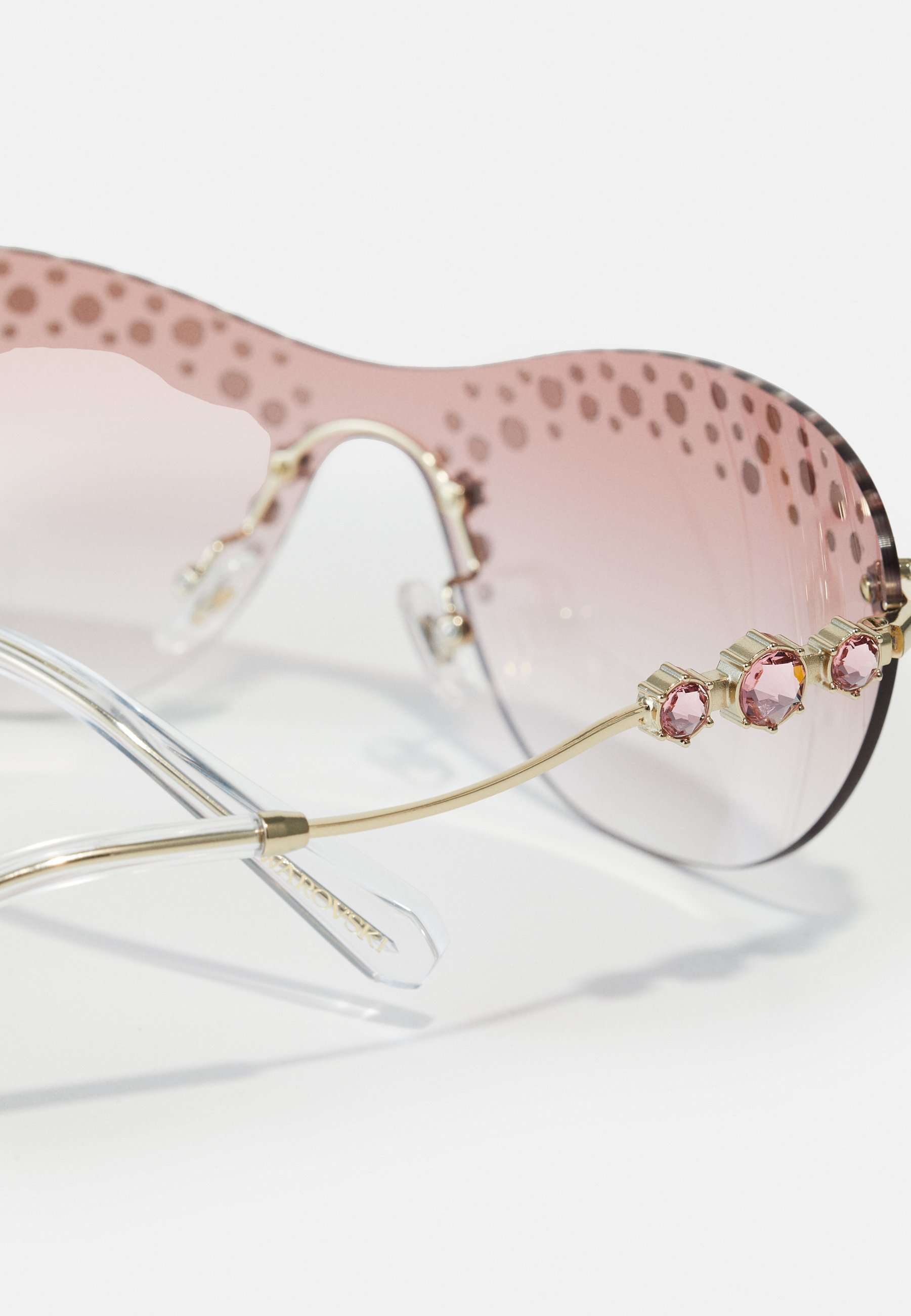 Occhiali da sole Swarovski - sfumatura oro pallido/rosa trasparente