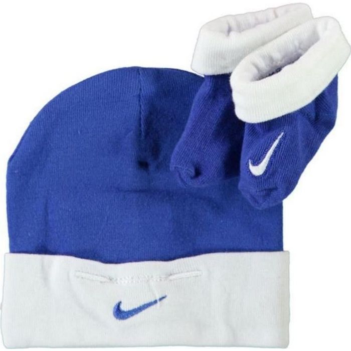 Conjunto de ropa para bebé Nike: gorro y patucos, azul marino y blanco.