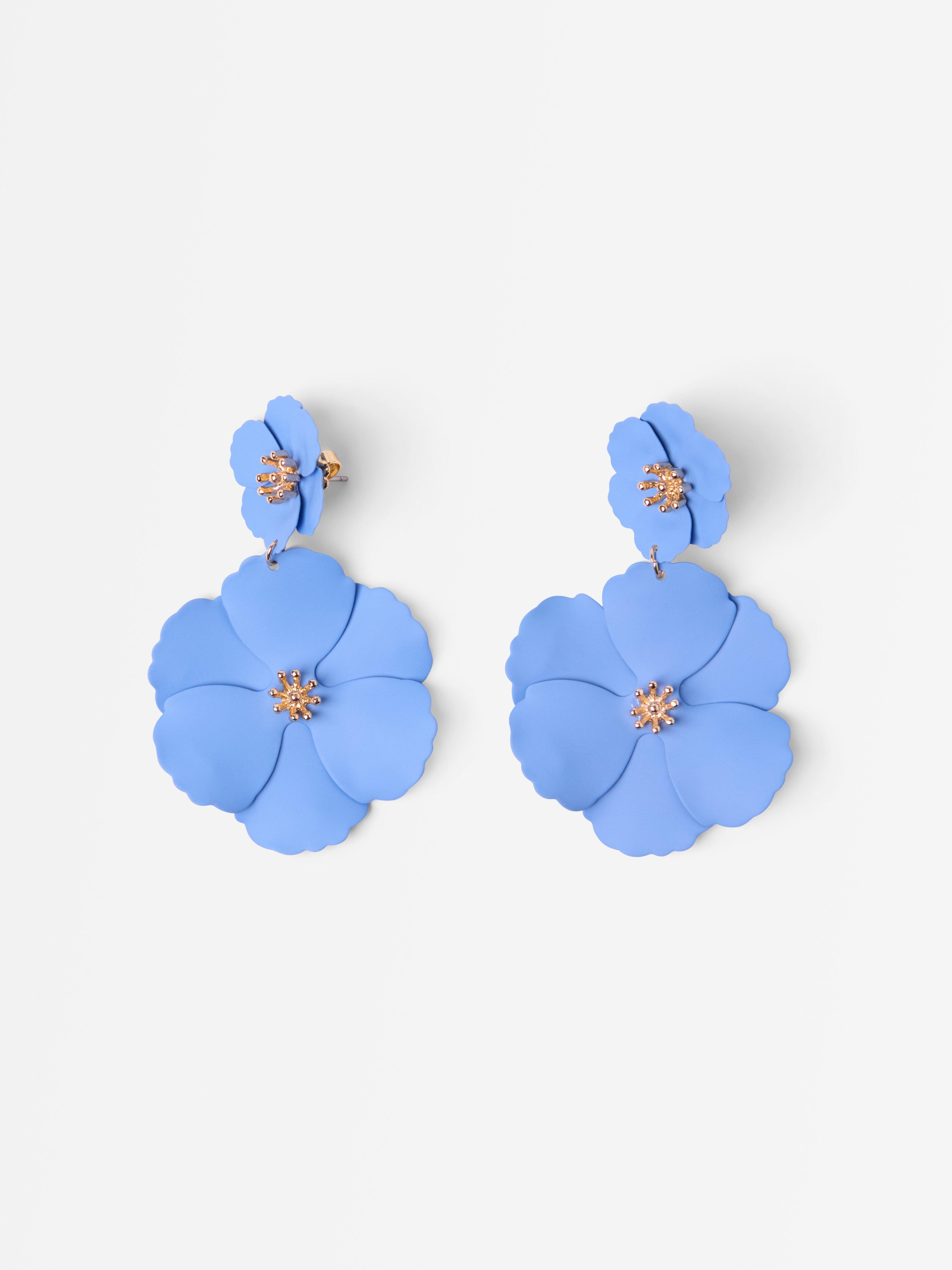 Brincos com flores azul-claro