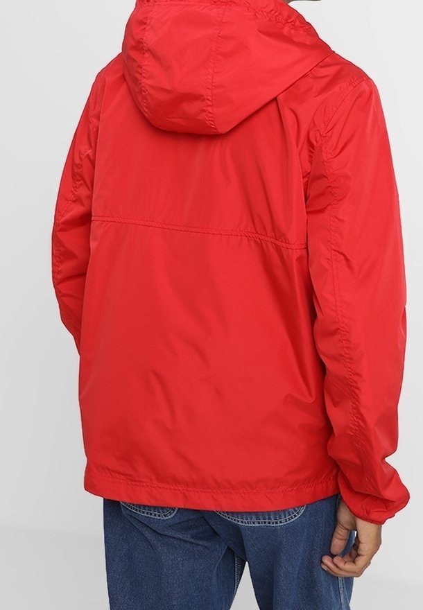 Jaqueta corta-vento Tommy Jeans - vermelha
