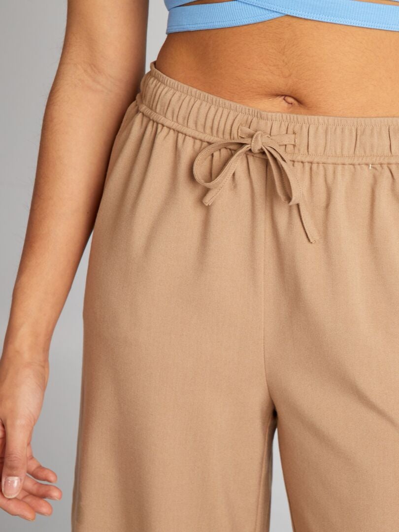 Stadsbroek met wijde pijpen - BEIGE
