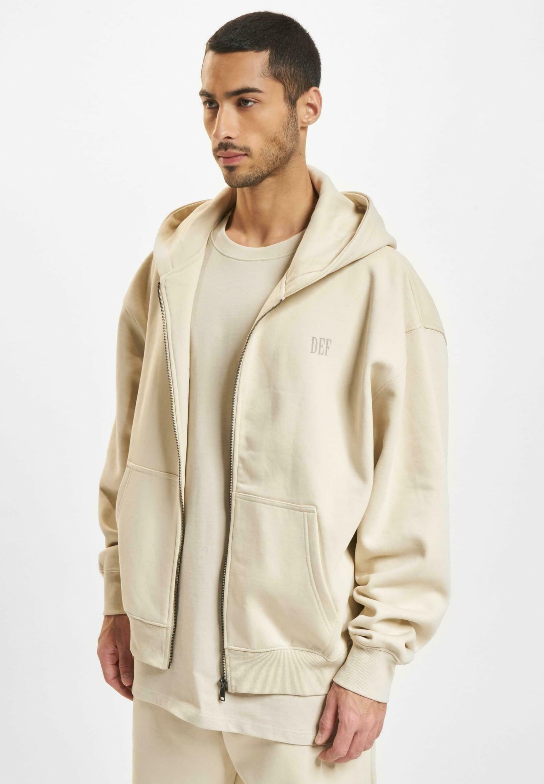 Felpa con zip DEF - bianco sabbia