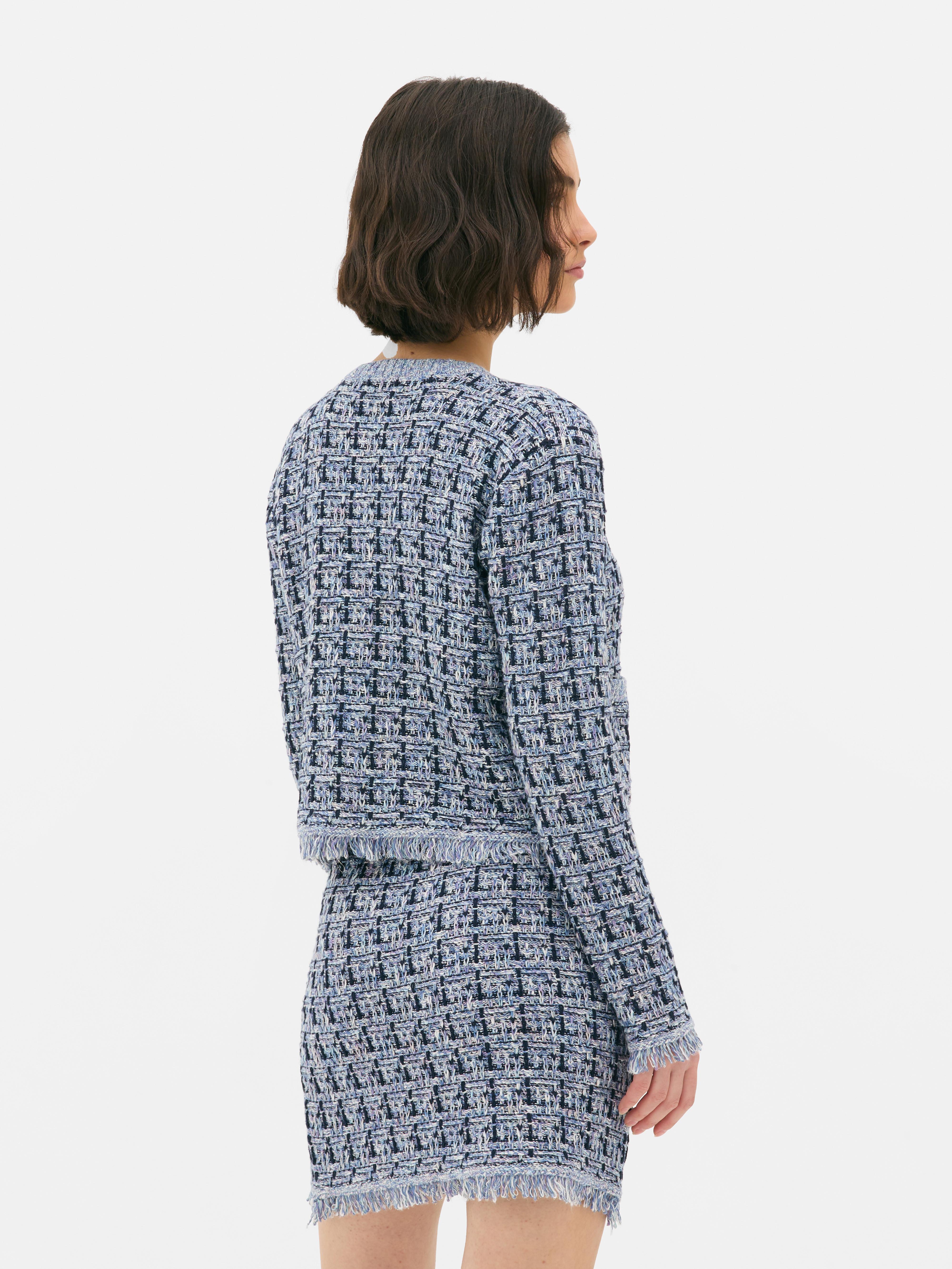 Skinnende tweed-cardigan Hold det elegant med denne trendy tweed-cardiganen