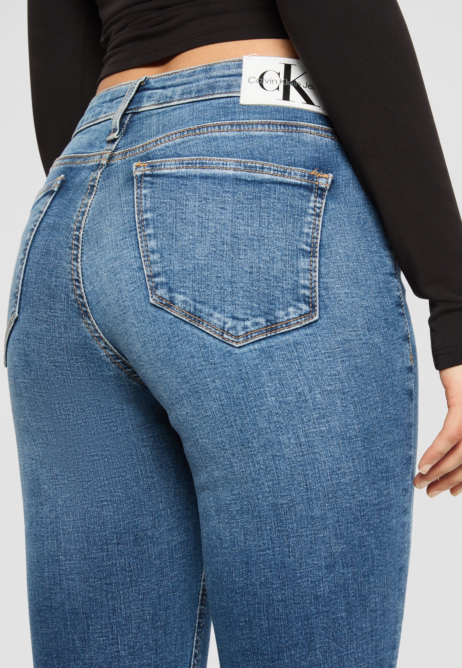 Calvin Klein Jeans MID RISE - Skinny Fit Jeans - donker denim