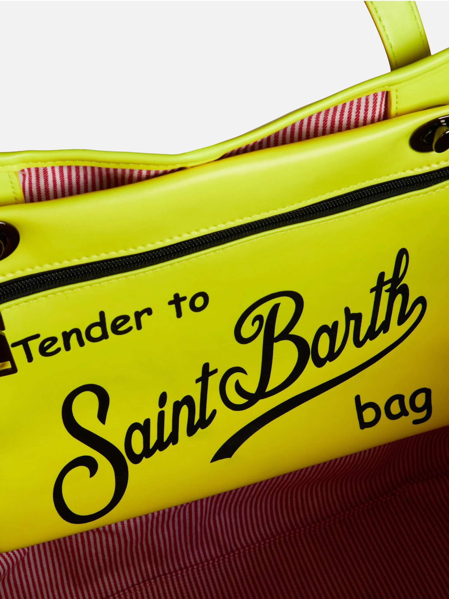 Zilverkleurige reflecterende tas met fluorescerend gele details.