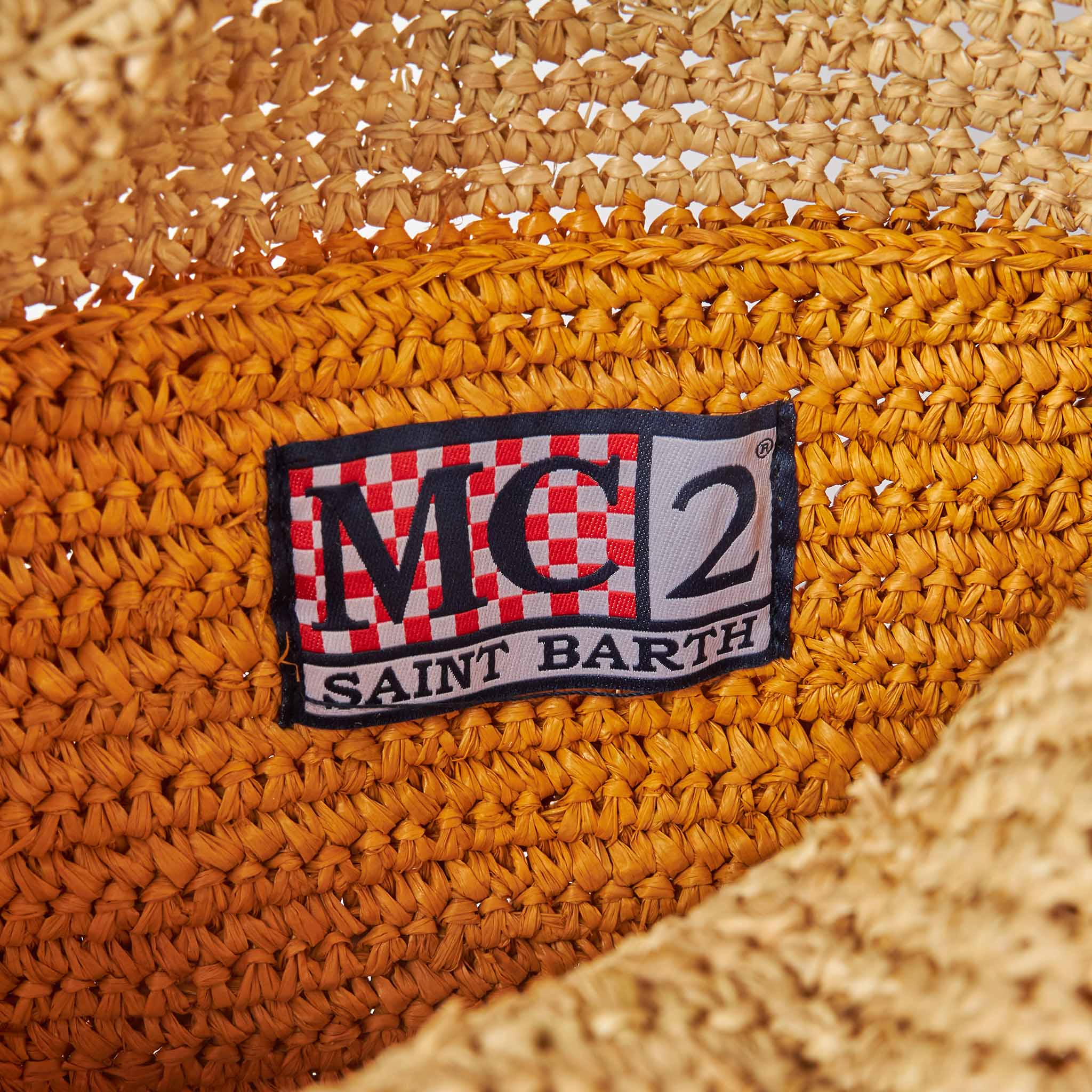 Raffia bucket bag met veelkleurige strepen en borduurwerk